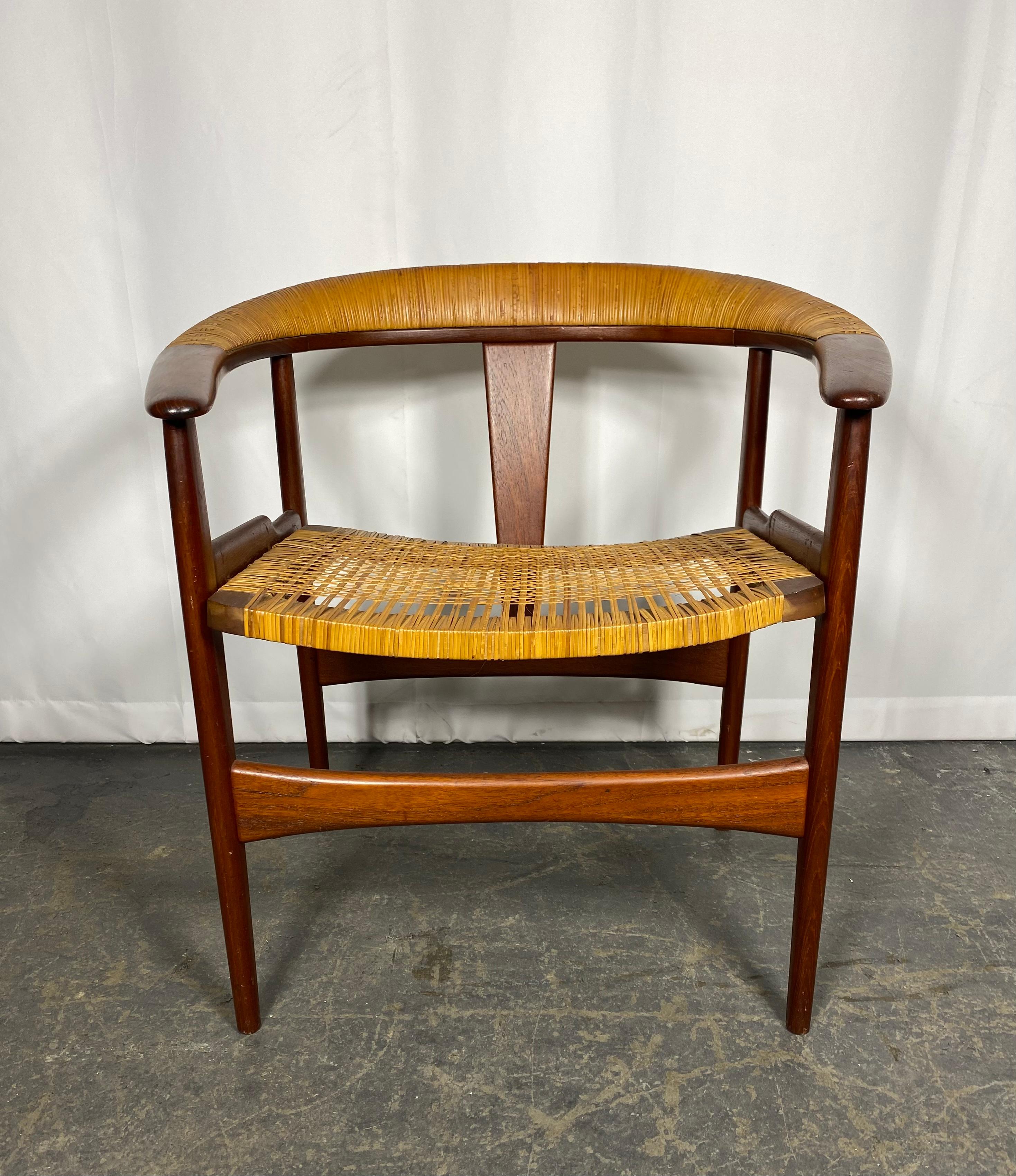 RARE ARNE HOVMAND-OLSEN barrel back chair teak / wicker, MODEL 171..Stunning design, Amazing patina, color , finish.  Extremely comfortable,,side dowels have been removed,, screws exposed,(see photo).Hand delivery avail to New York City or anywhere