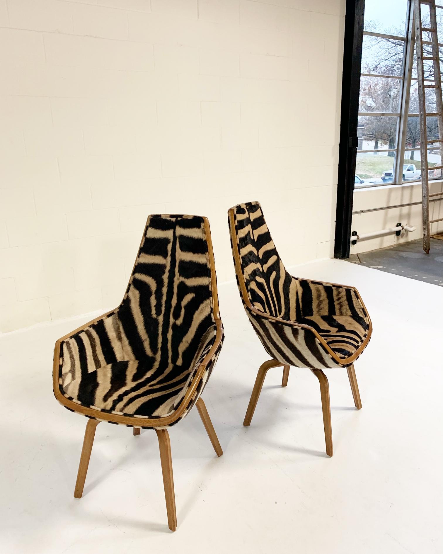 Beginning in 1956, Arne Jacobsen began his best know commission for the Royal SAS Hotel in Copenhagen. Designing the complete structure and furnishings, he created suchmodern icons as the Egg and Swan chair. The Giraffe chair, made of beech and
