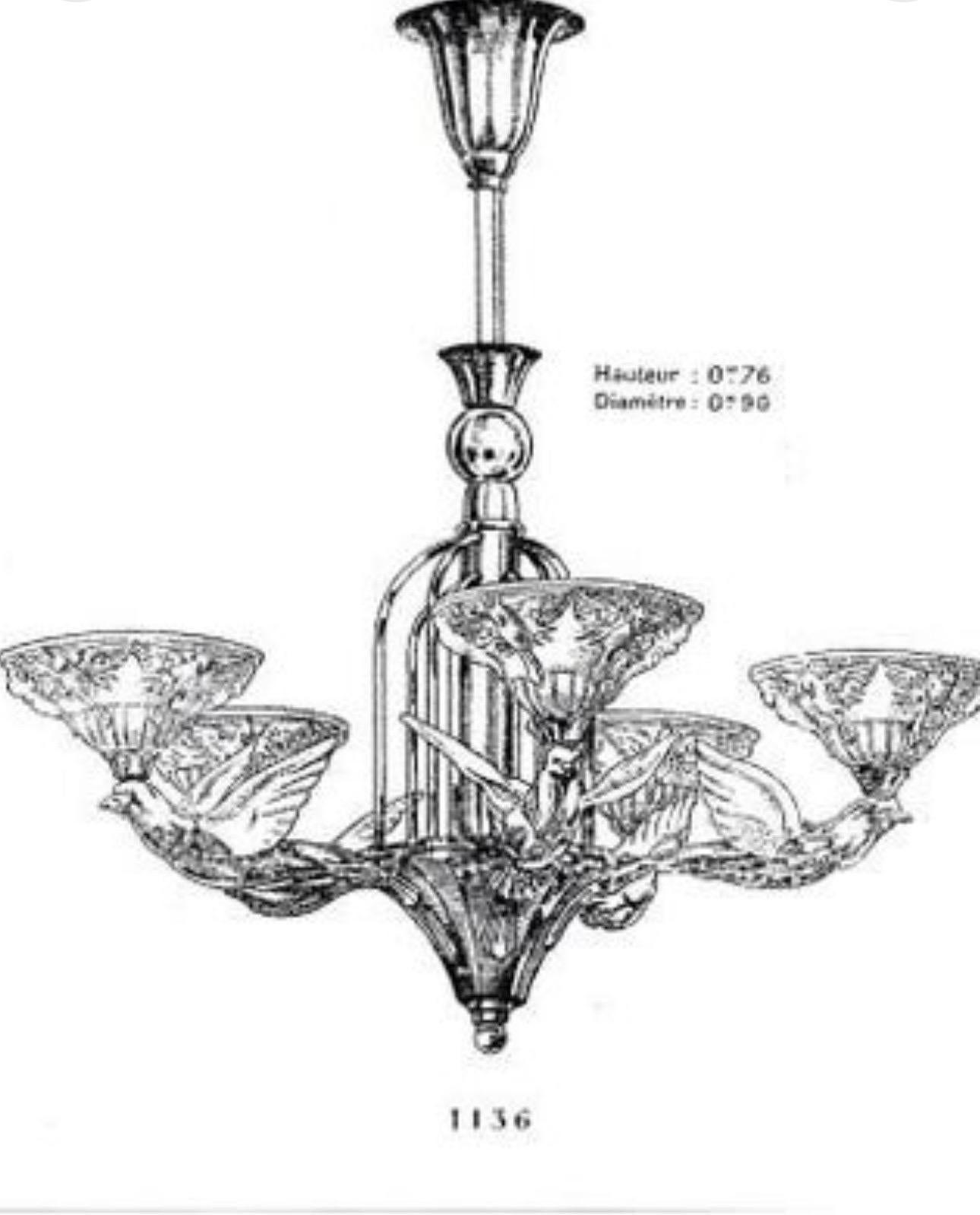 A beautifully and rare solid, nickeled bronze chandelier with five opalescent glass flying birds by Jean Boris Lacroix, model 1136.
France, ca. 1930s.
All glasses are signed ( LA+)
Socket: 5 x e14 and 5 x B22 
Diameter: 33.07 inches
Height: 35.43