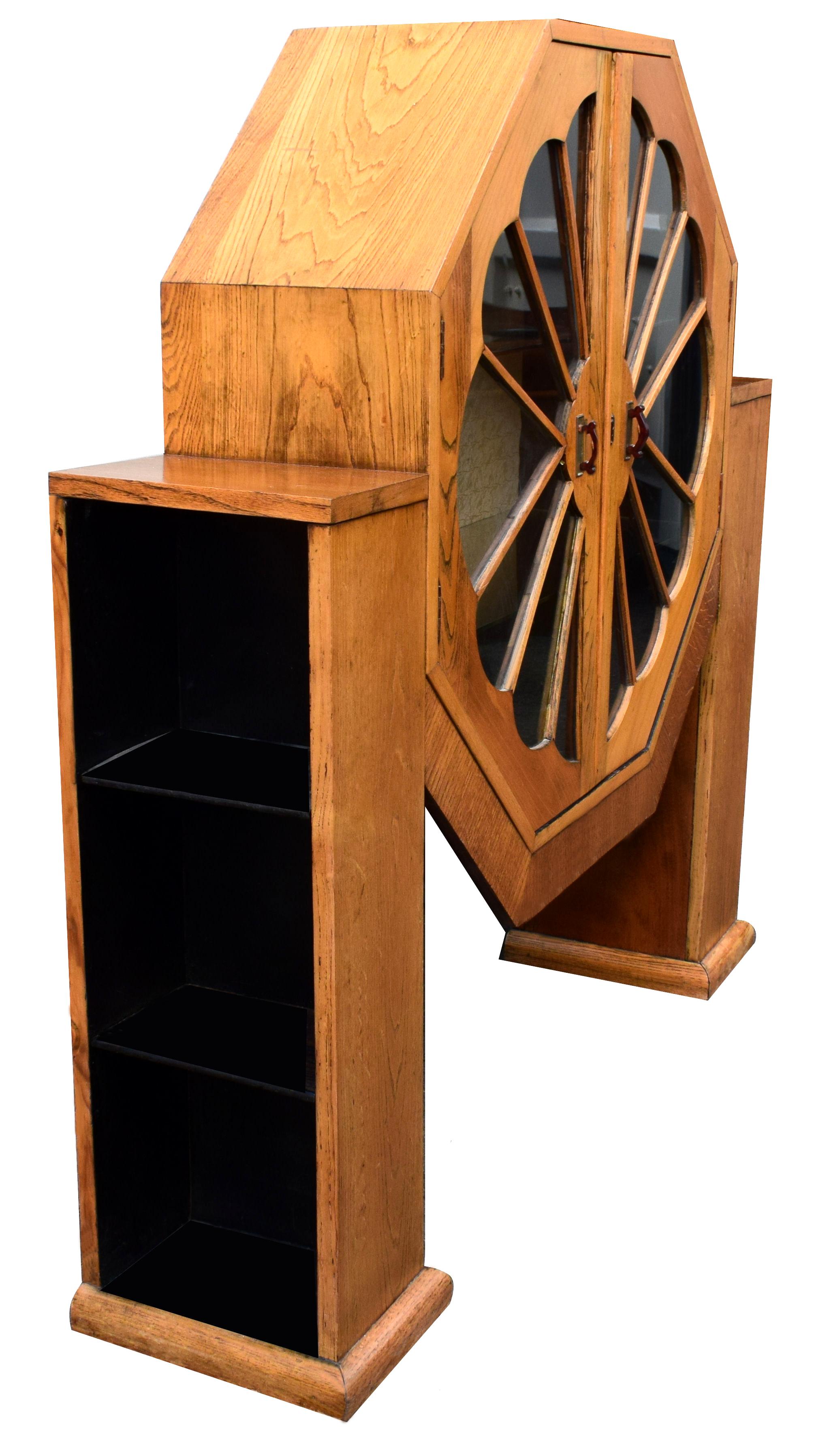 This has to be one of the rarest examples of the Art Deco display cabinets. If you want a focal point or a wow factor in a room then this is just the ticket. Not only does it look superb but is functional too, housing your special collections.