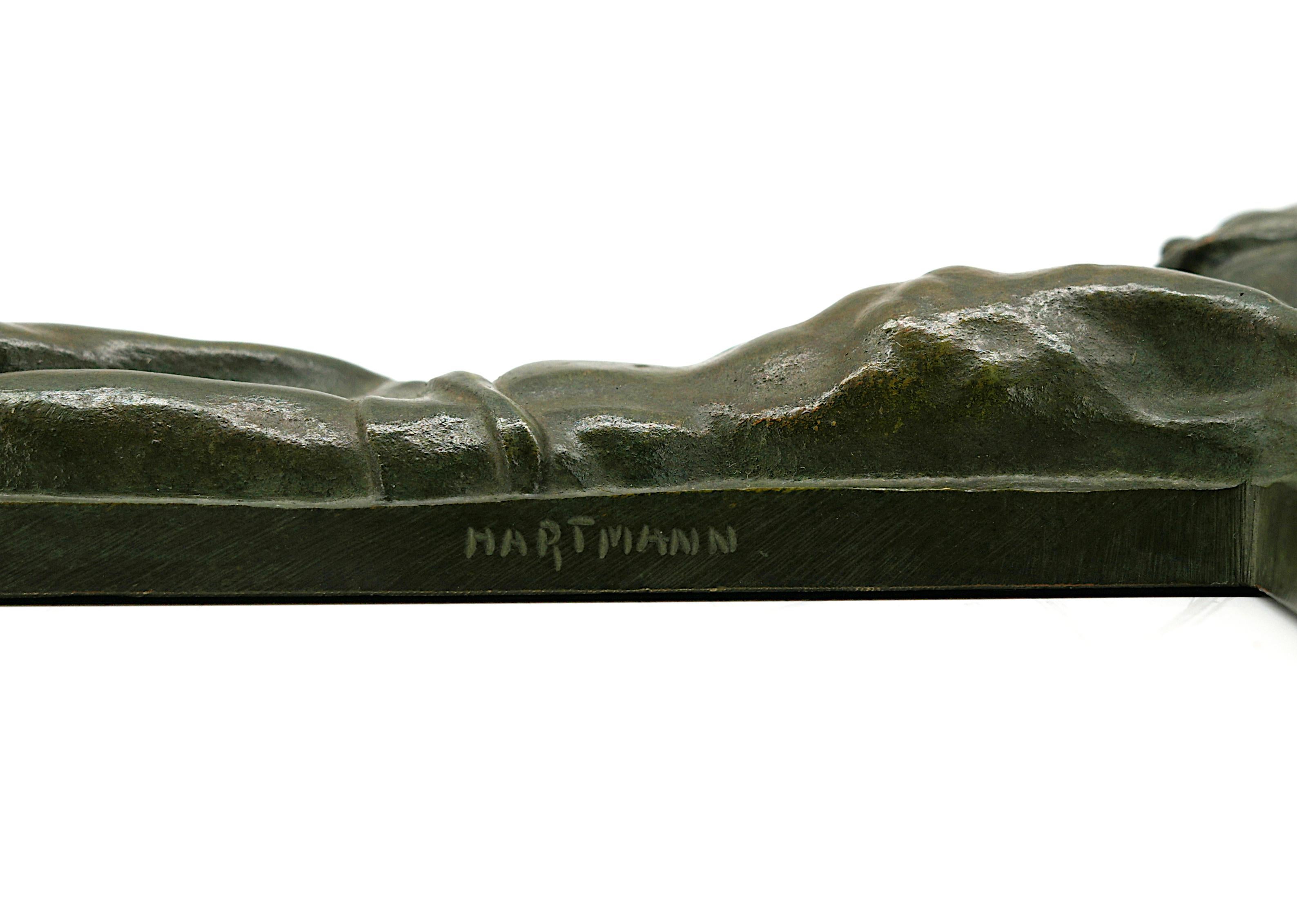 French Art Deco Bronze Crucifix by Peter Hartmann, Switzerland, 1920s. Elegant and rare French Art Deco bronze crucifix by Swiss sculptor Peter Hartmann, dating from the 1920s. This finely cast piece exemplifies the refined craftsmanship and