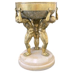 Rare centre de table Art Déco avec figures masculines nues, bronze doré, France