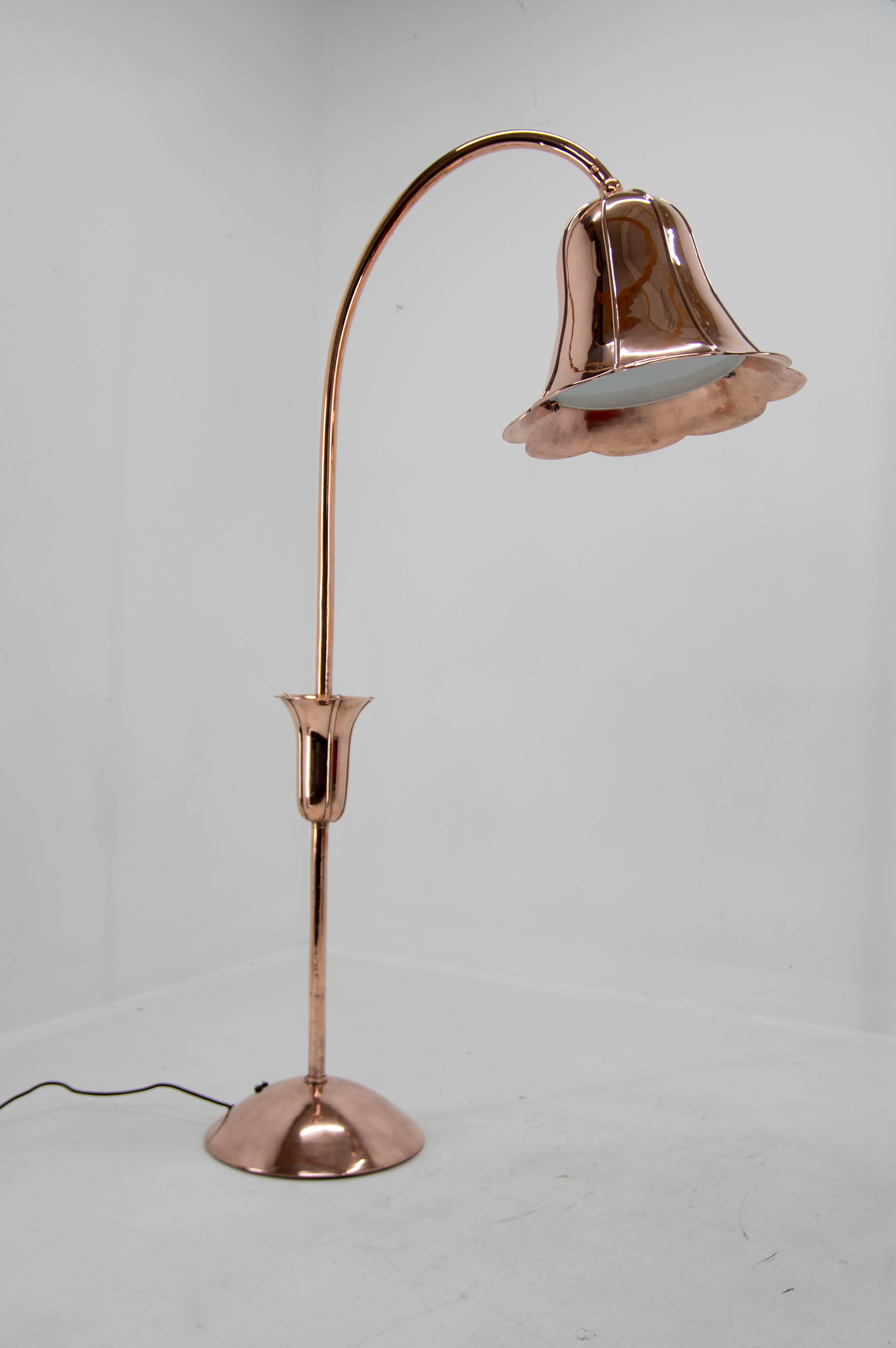 Probably the only one of its kind all-copper floor lamp in art deco style. Made around 1935 and completely restored: copper refinished, rewired - two separate circuits 2+1x60W, E25-E27 bulbs. Two switches. Glass cover of the bulbs.
US plug adapter