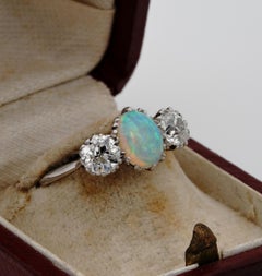 Rare Art Deco G VVS 1.65 Carat Diamond 1.25 Carat Opal Platinum Trilogy Ring