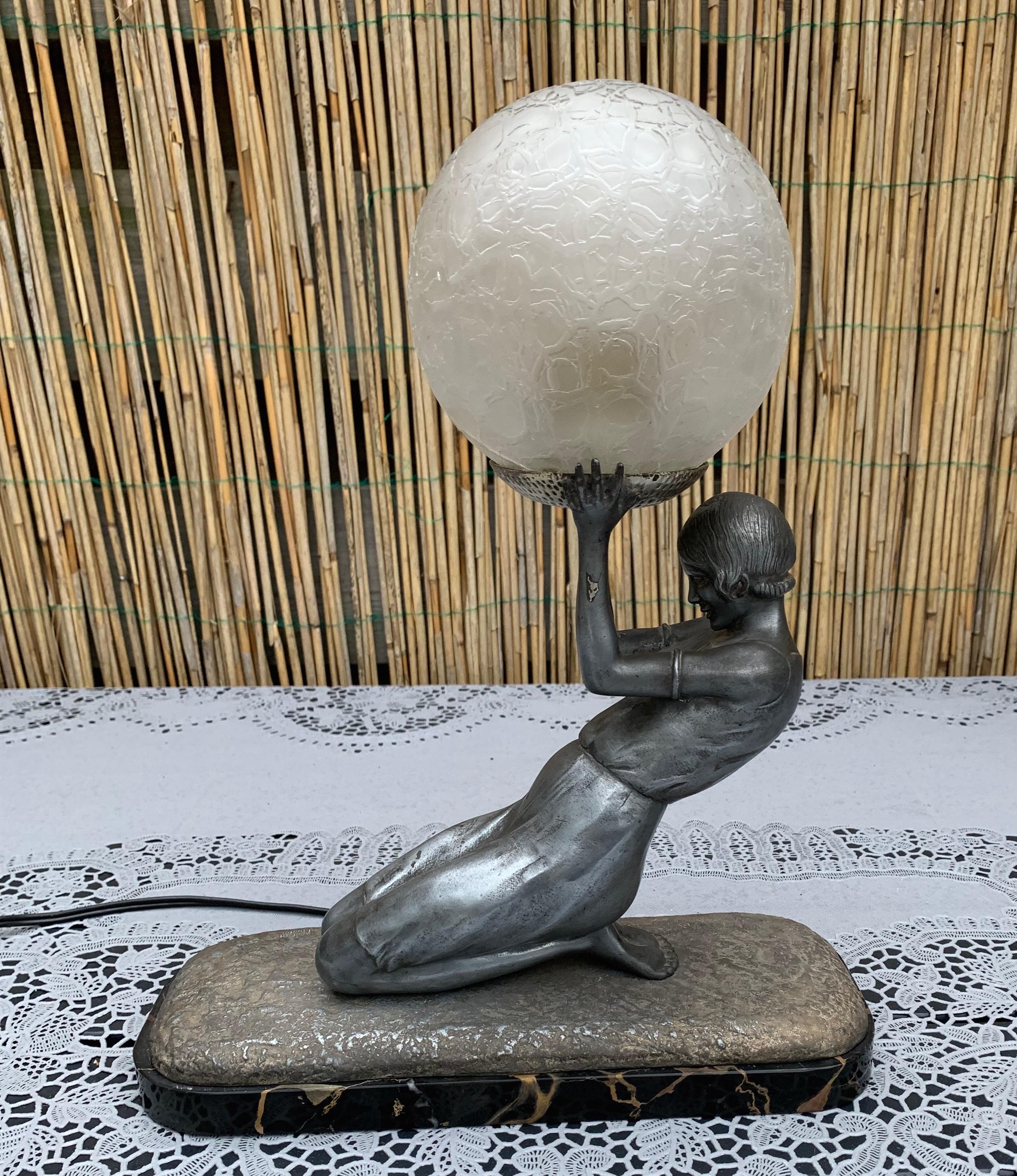 Original Antique work of lighting art, designed by Janle and made by the Max Le Verrier foundry.

This early 20th century table or desk lamp embodies everything we love about art and antiques. The beautiful female sculpture is a true work of art