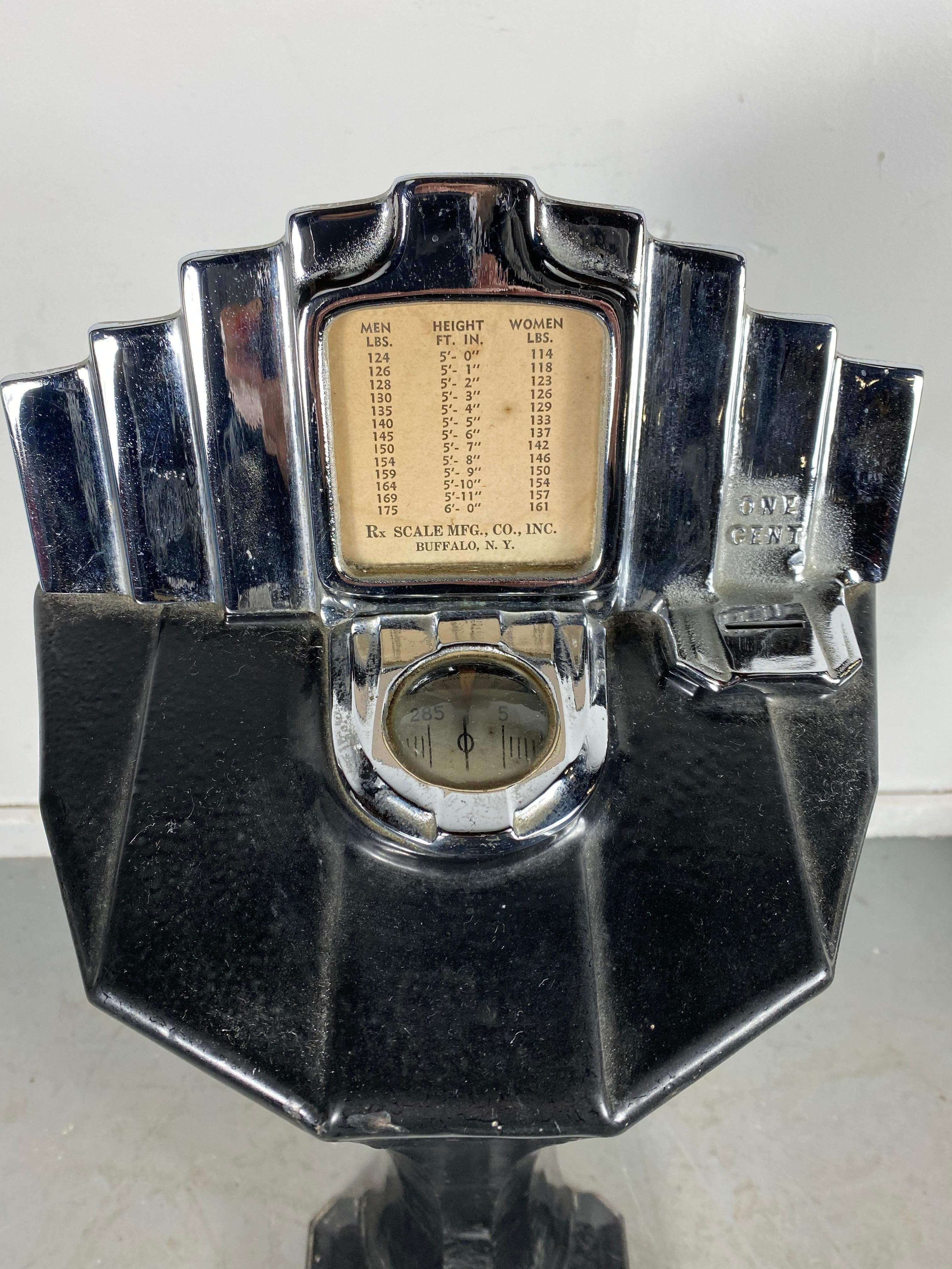 Stunning Art Deco Penny scale salvaged from old downtown Buffalo NY drug store, perfect working condition, accurate weight, retains original key/ keys. Great size and proportion, perfect addition to your Art Deco. Mid-Century Modernist bathroom.