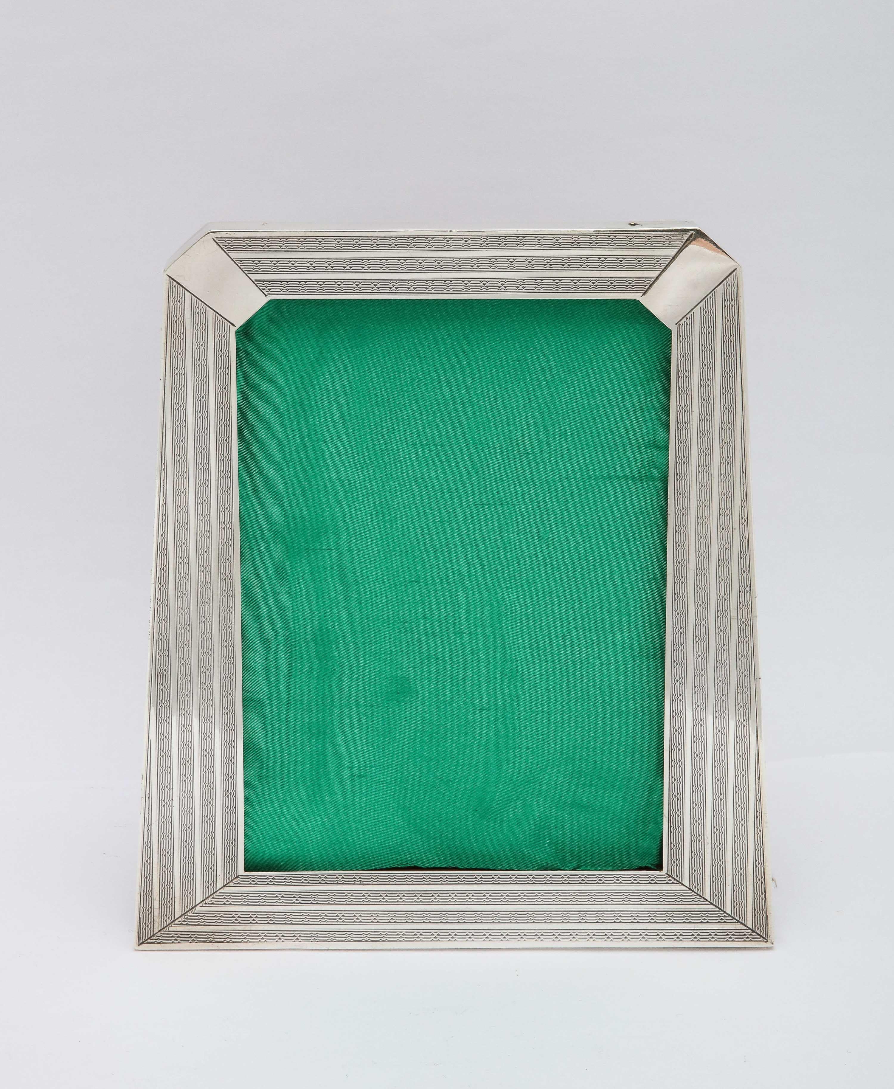 Rare, unusual, Art Deco sterling silver hexagonal picture frame with wood back, Birmingham, England, year-hallmarked for 1928, P.J. Finch - maker. Frame is engine-turned and tuxedo-striped in design, having two non-engine-turned areas in each top