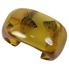 Raro bracciale per acquario in bachelite Art Carved con intaglio al contrario del succo di mela