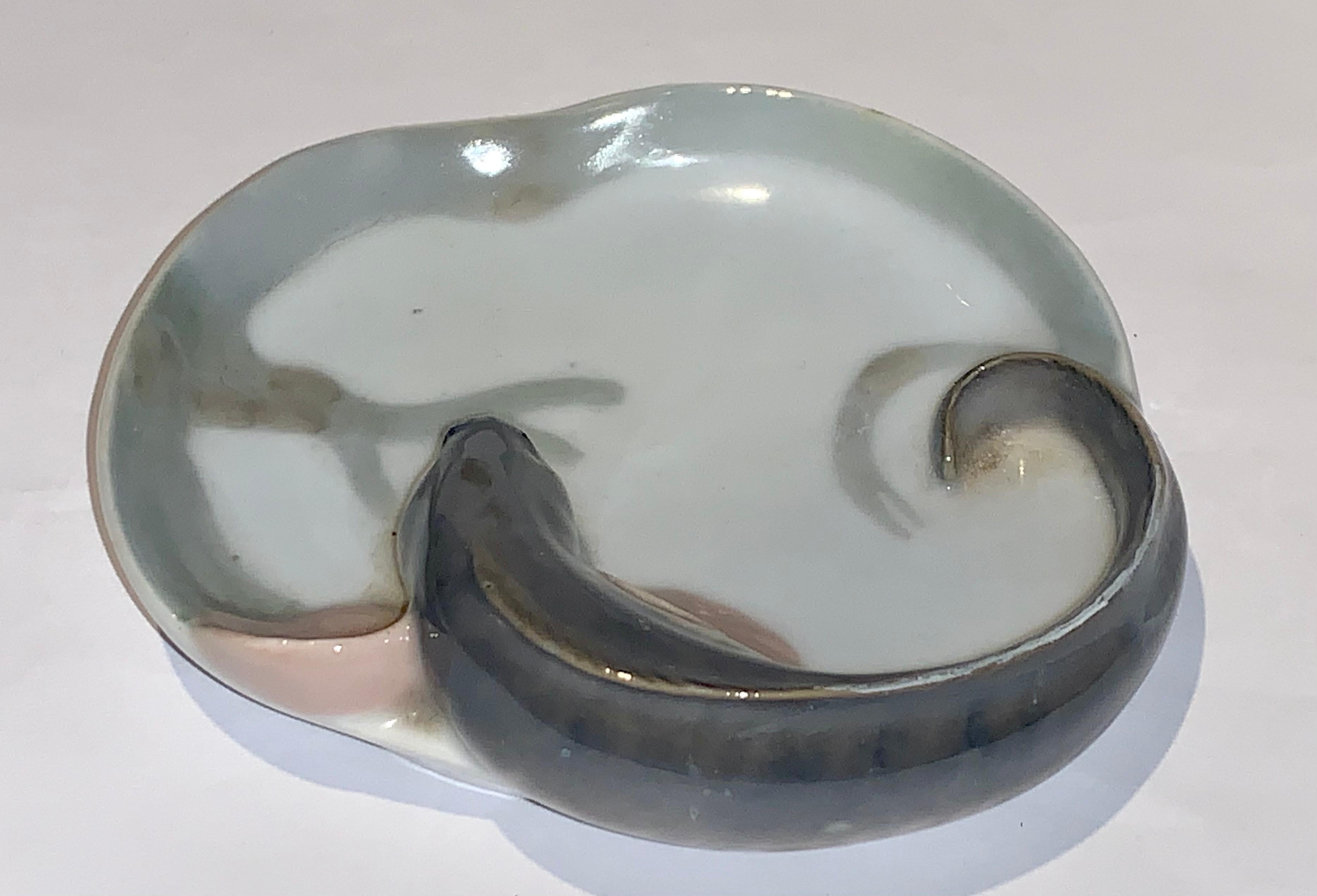 A nice quality Royal Copenhagen tray with an Eel fish decoration.
This is painted in lovely subtle tones with exceptional moulding and made circa 1920. Marked on the base Royal Copenhagen and numbered 1139. Presented in very good condition and