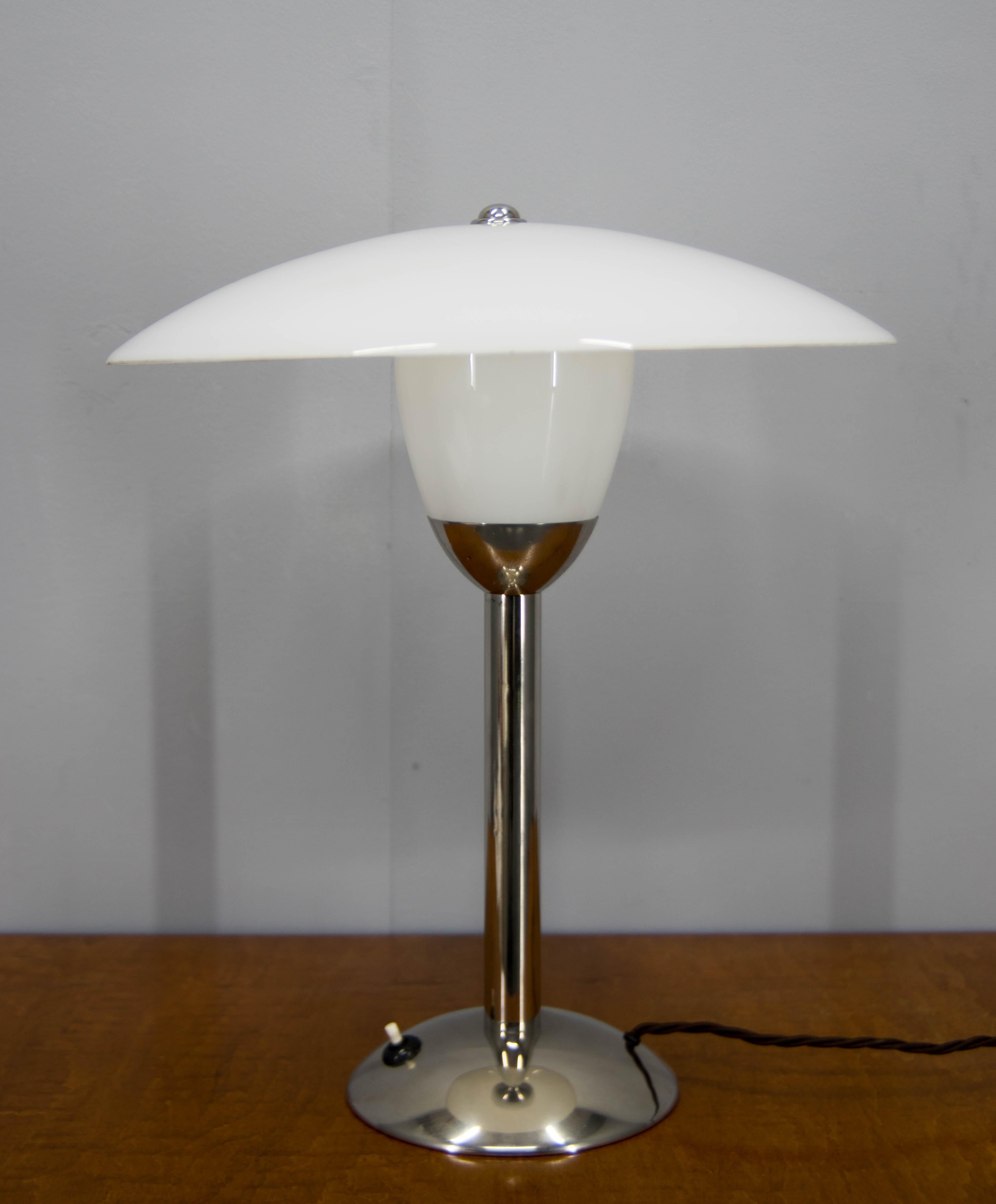 Chrome-plated Art Deco table lamp designed by Miloslav Prokop (1896-1954) and executed by Franta Anyz. Inner white opaline glass bulb cover. Big shade from opaline glass. Cleaned, polished, rewired. Original glass without any damage. Minor losses of