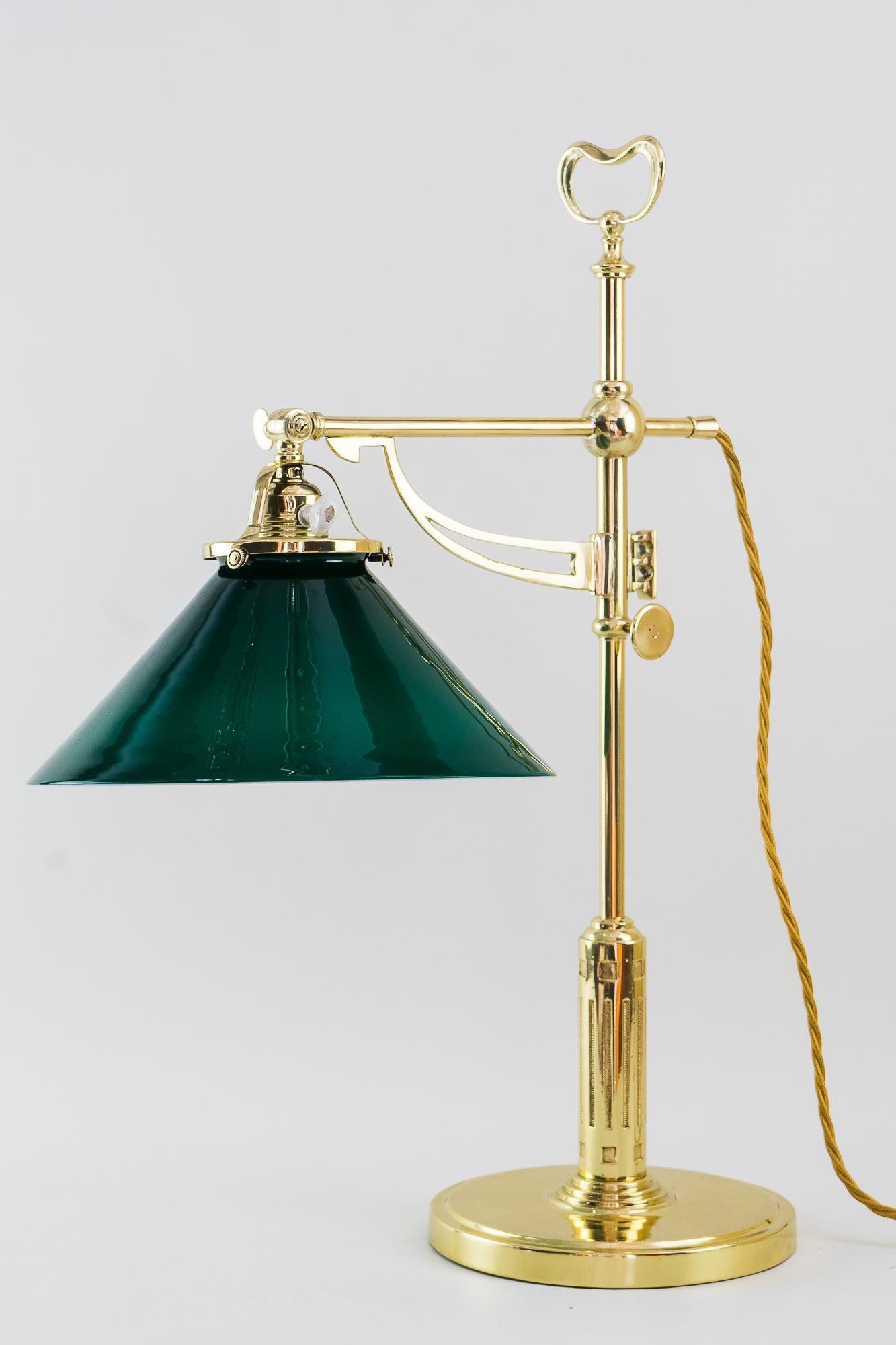 Rare Art Deco table lamp, Vienna, circa 1920s
Polished and stove enamelled
Original old glass shade
Opal green glass
The height is adjustable of the lamp.