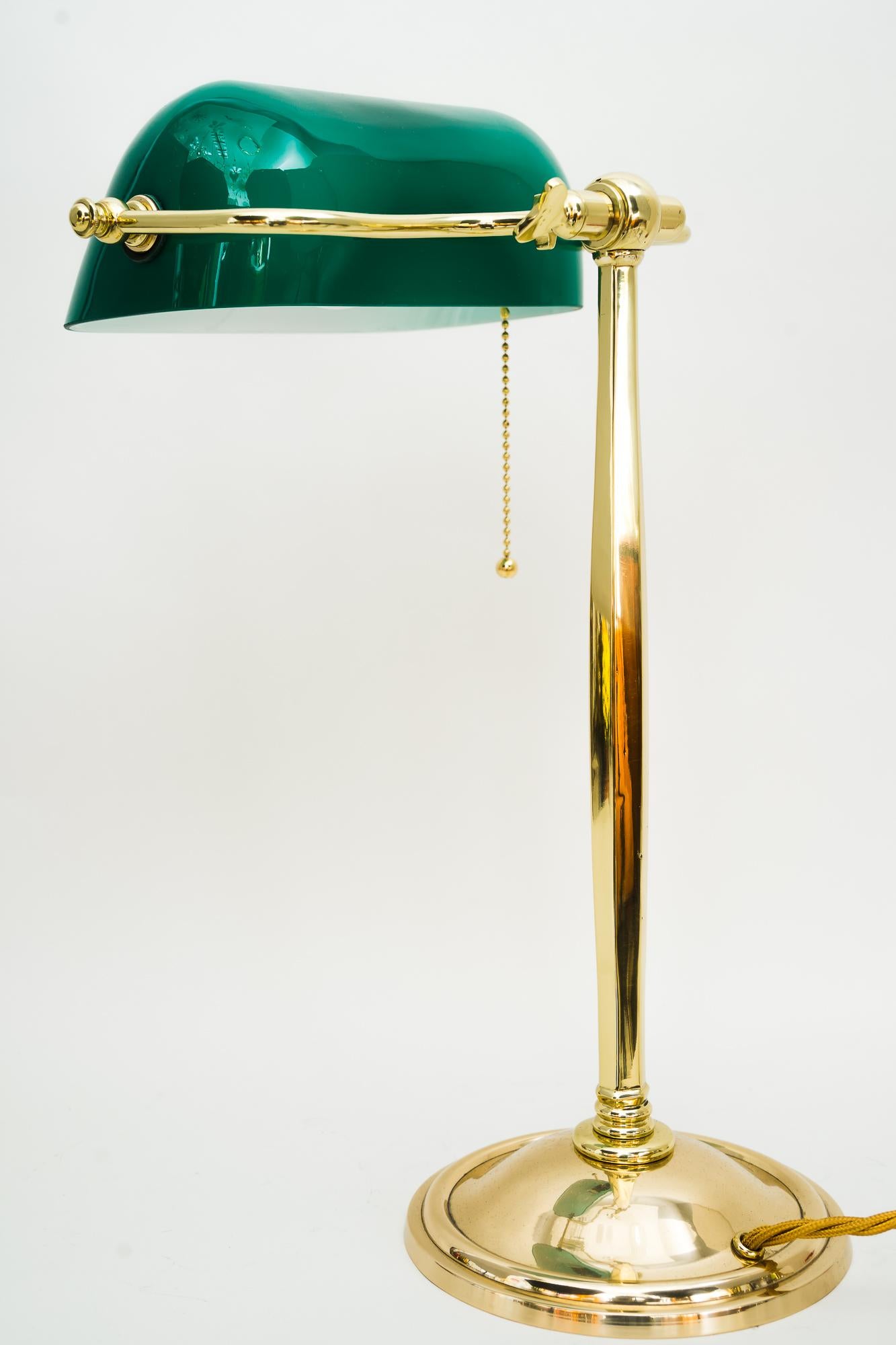 Rare Art Deco table lamp with original glass shade vienna around 1920s
Polished and stove enamelled
Original glass shade
The hight is adjustable from low 40cm ( 44cm middle position ) up to 56cm.
