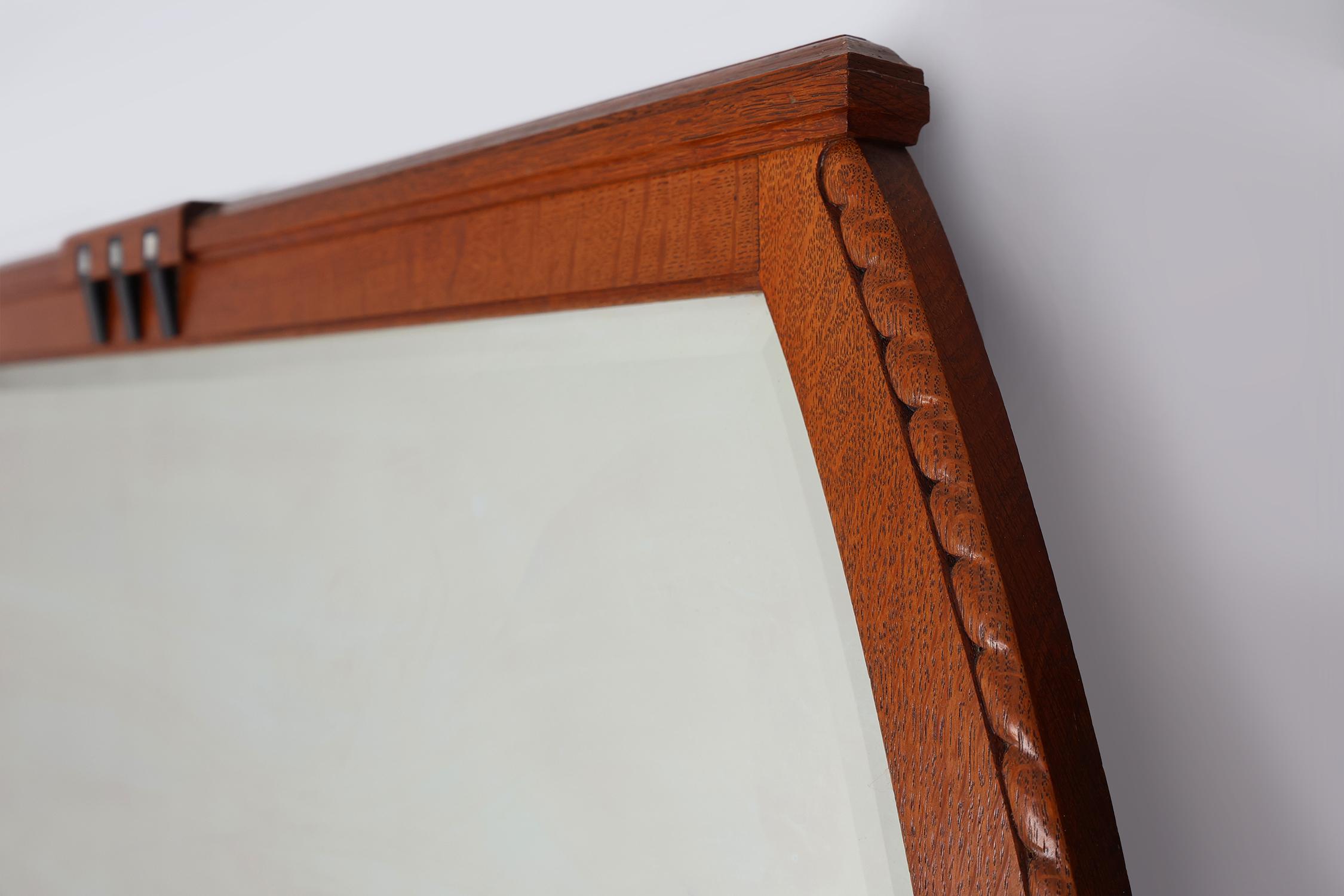 Belgian Rare Art Nouveau oak mantel mirror attr. to De Coene with facet cut mirror, 1905 For Sale