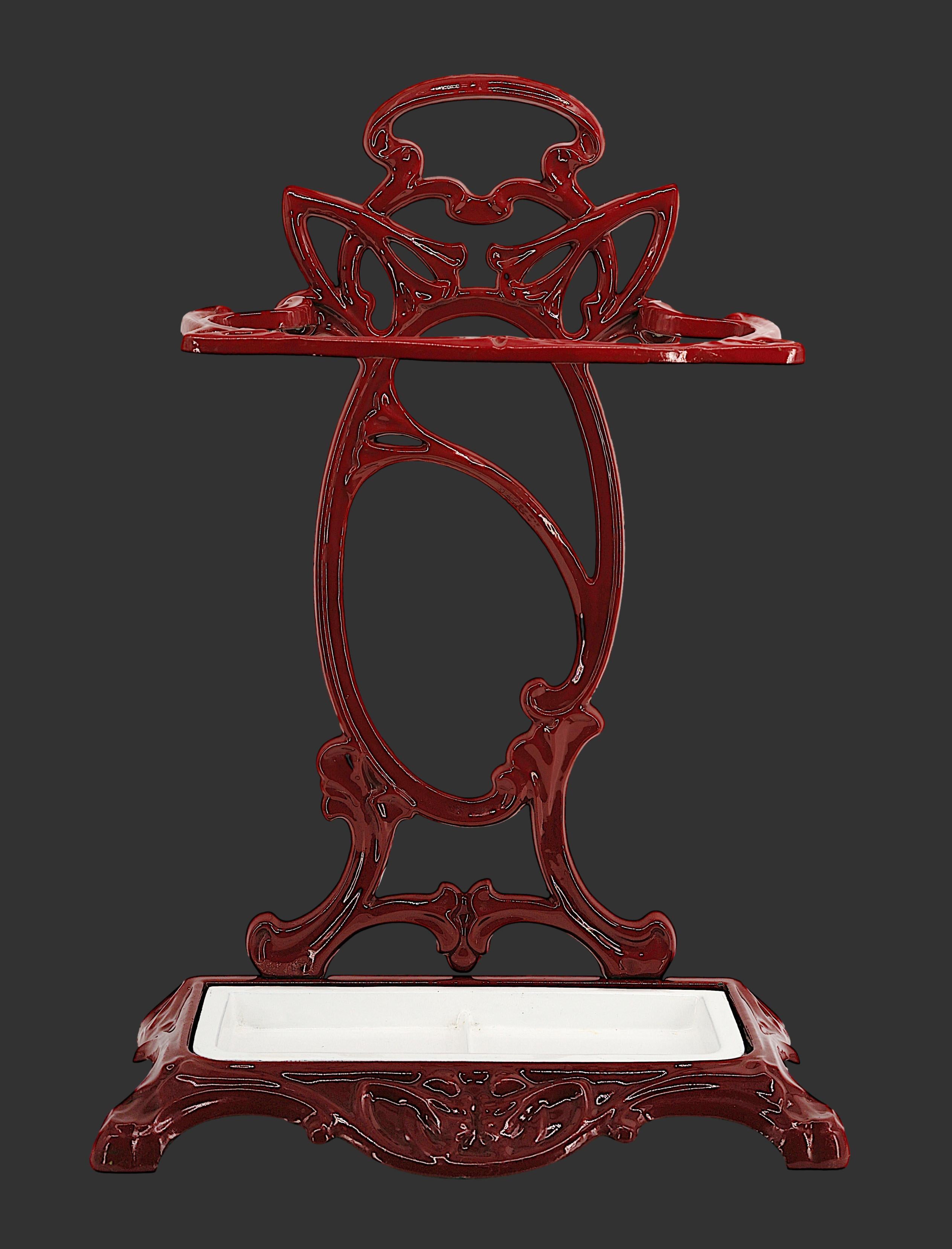 French Art Nouveau cast iron umbrella stand, circa 1900. Rare in this color. This exquisite French Art Nouveau umbrella stand dates back to circa 1900 and is crafted from high-quality enameled cast iron. Close to the work of Hector Guimard or Louis