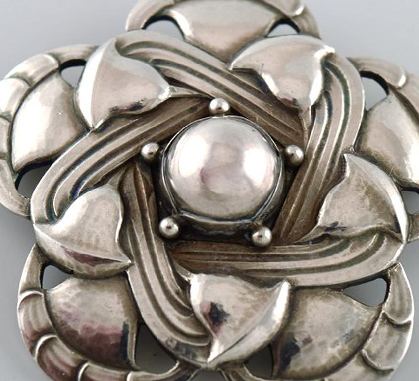 Rare art noveau brooch in sterling silver by Georg Jensen. Design number 12.
Stamped.
In very good condition.
Measures: 4.3 cm.
Literature: Similarly pictured p. 82 in the book: Georg Jensen a tradition of splendid silver by Jane Drucker.