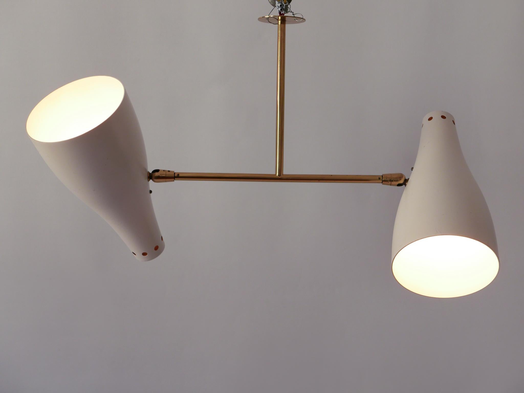 Extremely rare, elegant and articulated Mid-Century Modern two-armed sputnik ceiling fixture or pendant lamp. Adjustable shades. Designed & manufactured in Austria, 1950s.

Executed in brass and in beige color enameled aluminium, the lamp needs 2