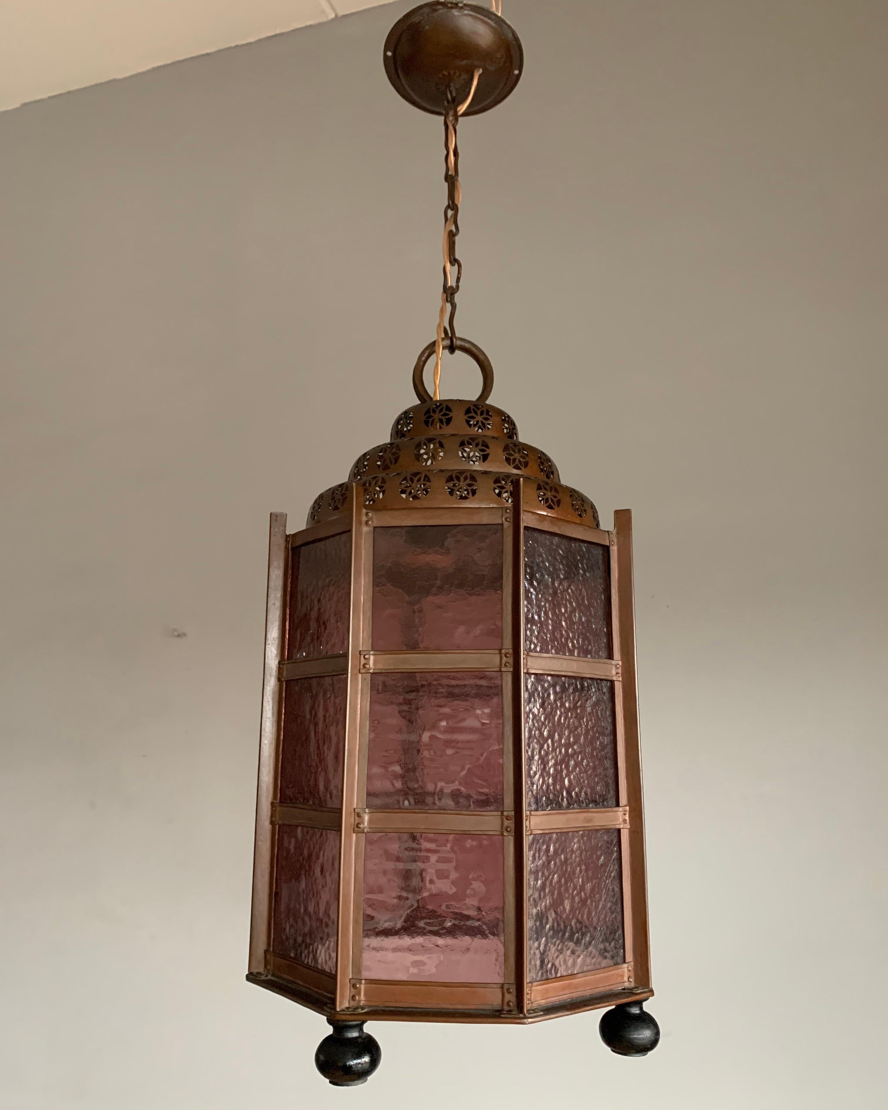 One of a kind and great looking antique pendant with cathedral glass.

With antique light fixtures as one of our specialties, we know how rare handcrafted Moorish lanterns are and to have found one of this age, size and beauty sure made our day.