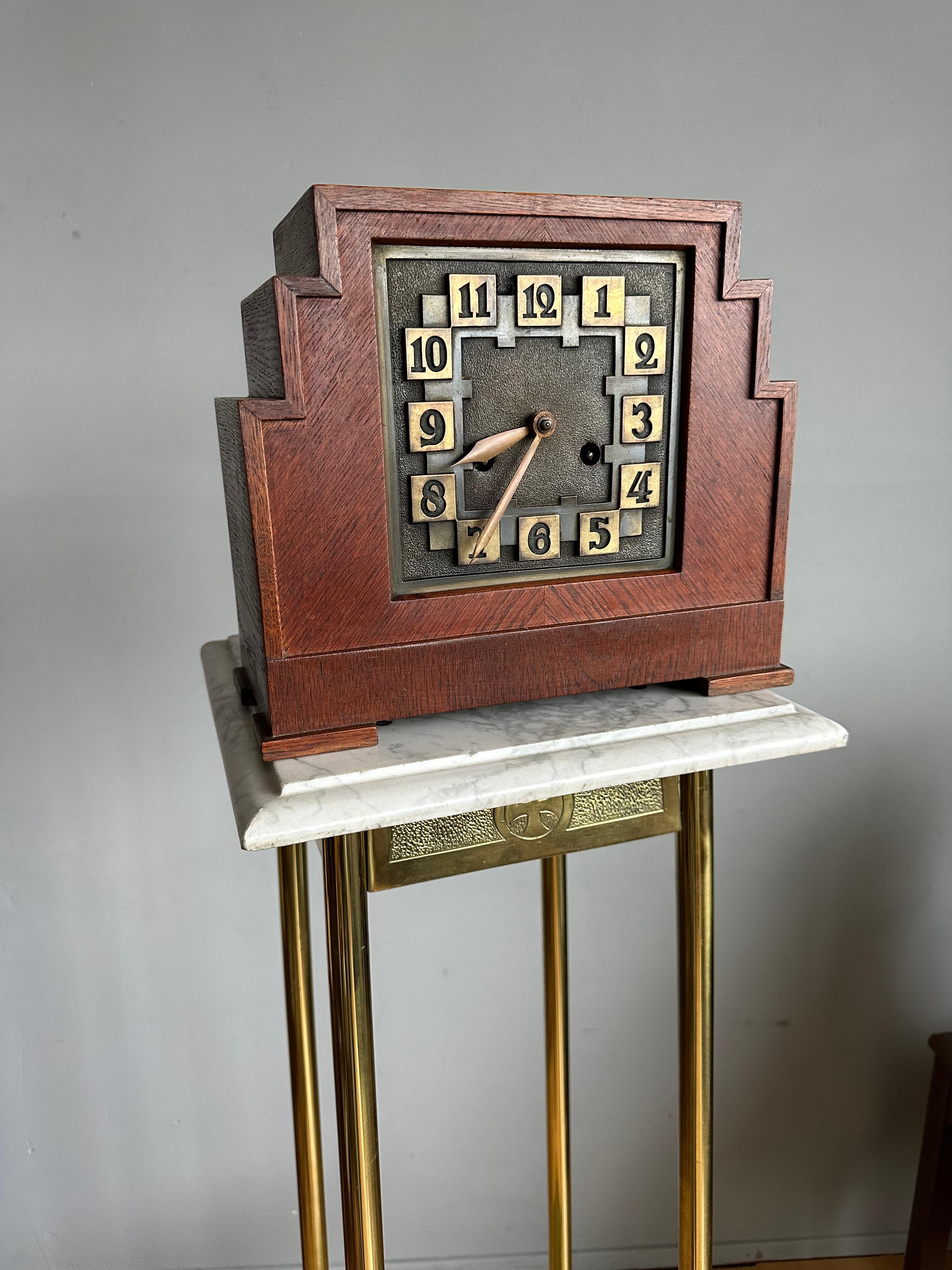 Early 20th century, great condition Dutch Arts & Crafts mantle / table / desk clock.

To have found this stunning and wonderful design, Dutch Arts & Crafts table clock was a treat, but to find it in this amazing condition again made our day. For it