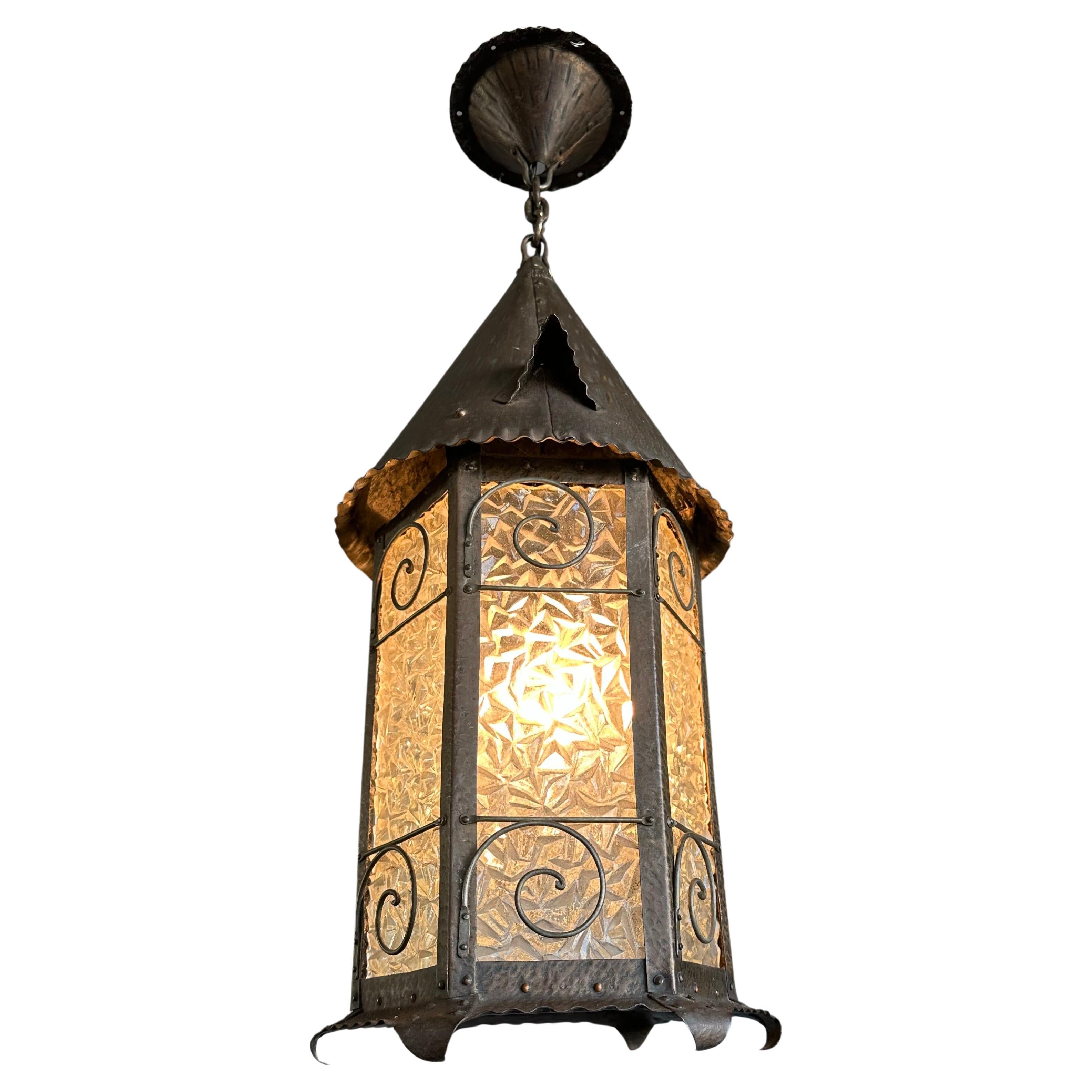 Antique and impressive, quality made light fixture.

If you are a collector of rare and all-handcrafted art and antiques then this sizable and one of a kind pendant could be flying your way soon. With antique light fixtures being one of our
