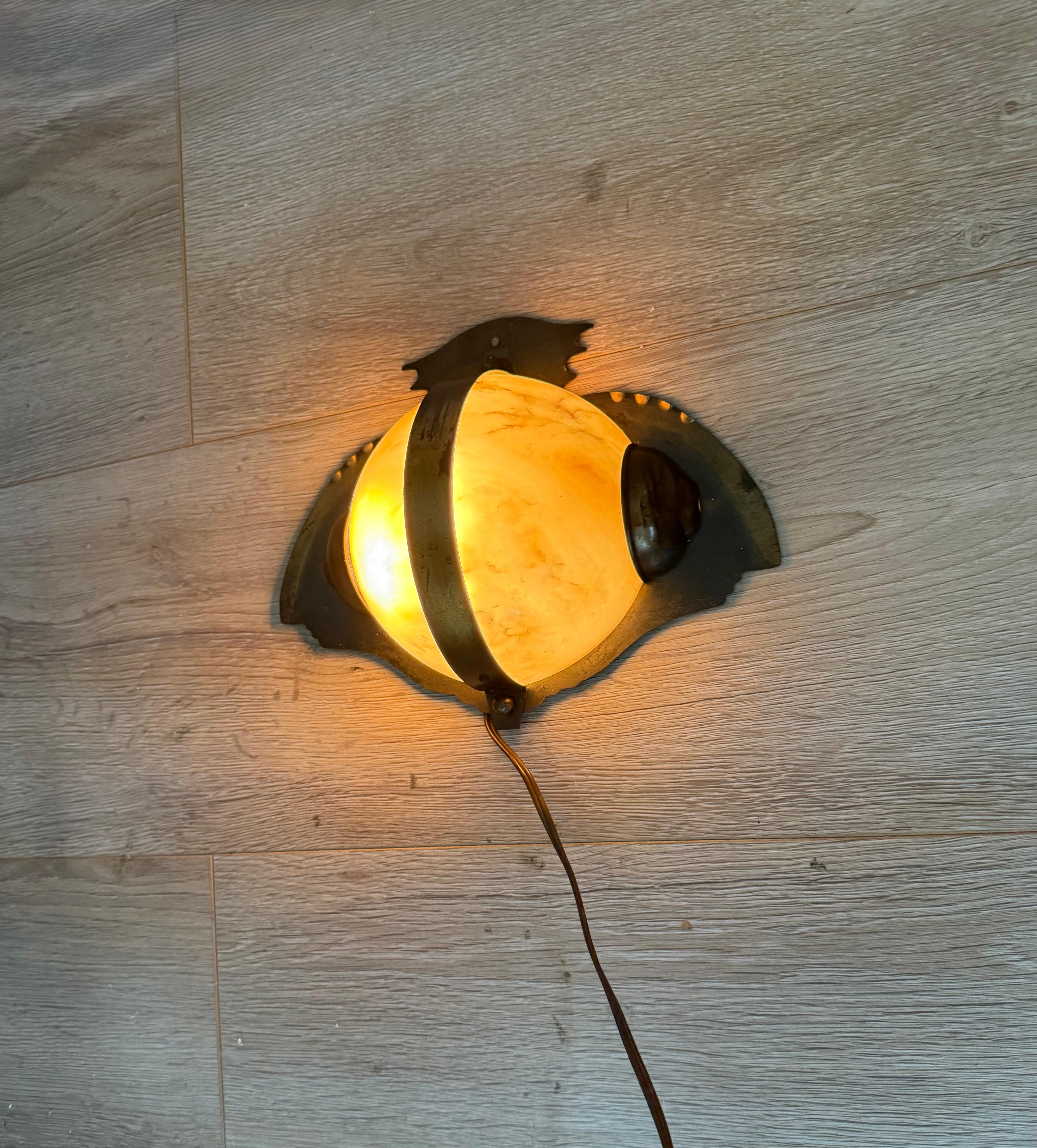 European Rare Arts & Crafts Hand-Crafted Brass and Alabaster “Owl-Like” Wall Sconce 1930s For Sale