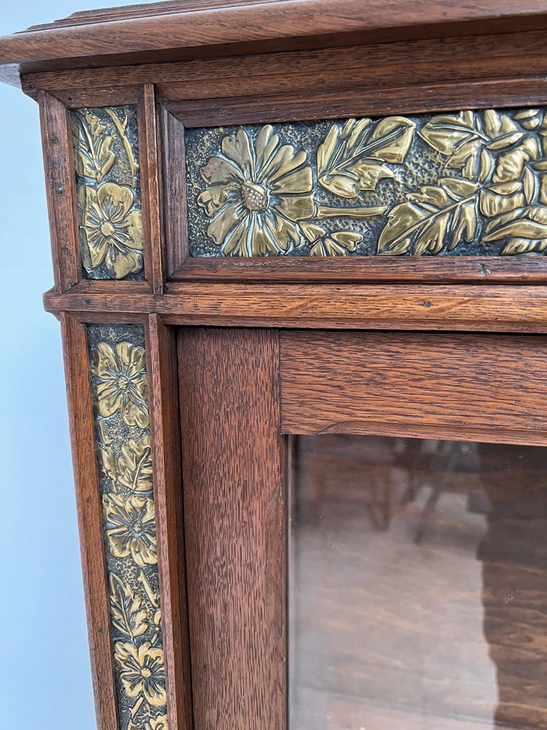 Rare Arts & Crafts Oak Display Cabinet / Vitrine with Embossed Brass Decorations For Sale 9