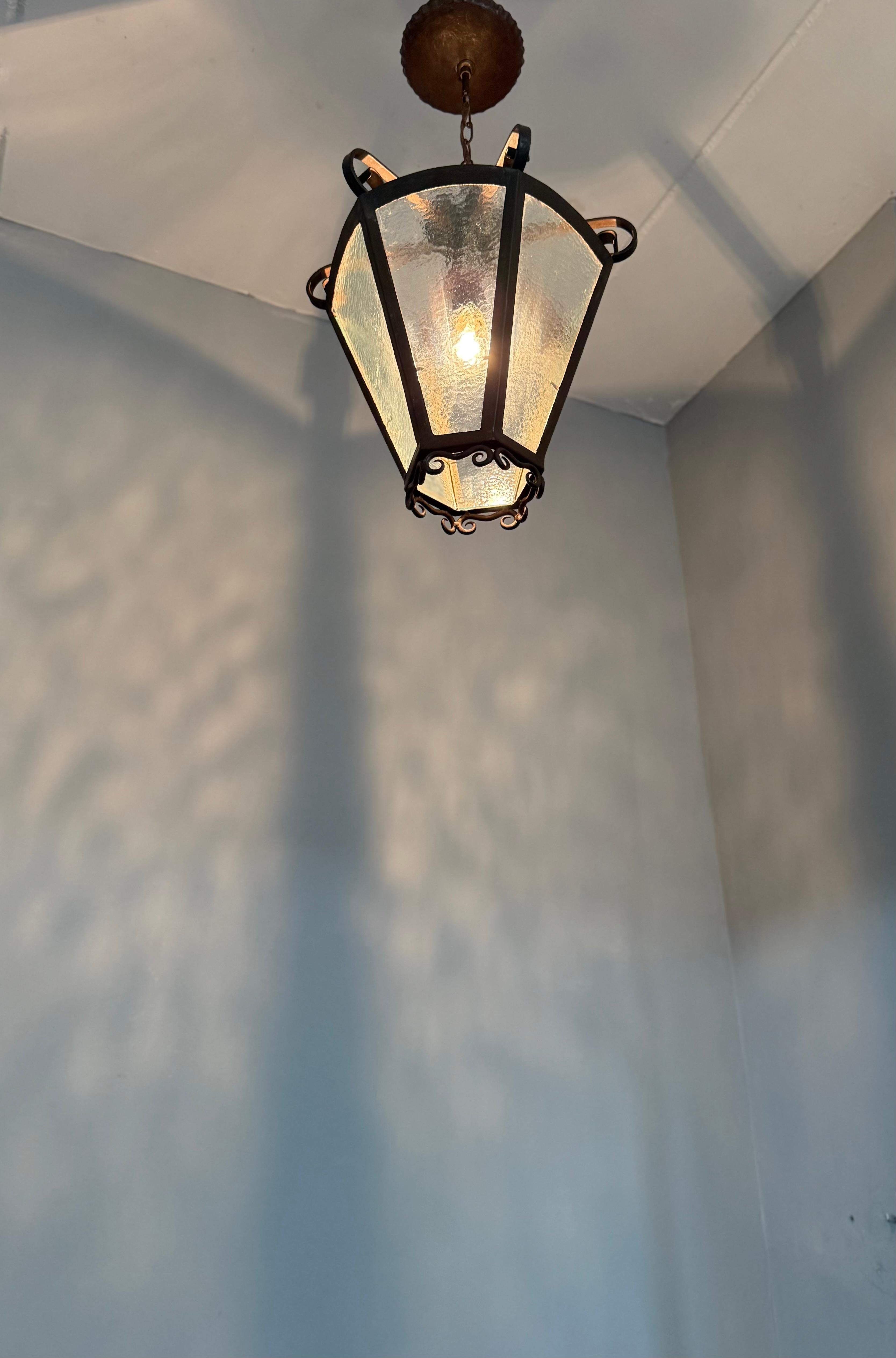 European Rare Arts & Crafts Pendant Lantern, Handcrafted Wrought Iron & Cathedral Glass For Sale
