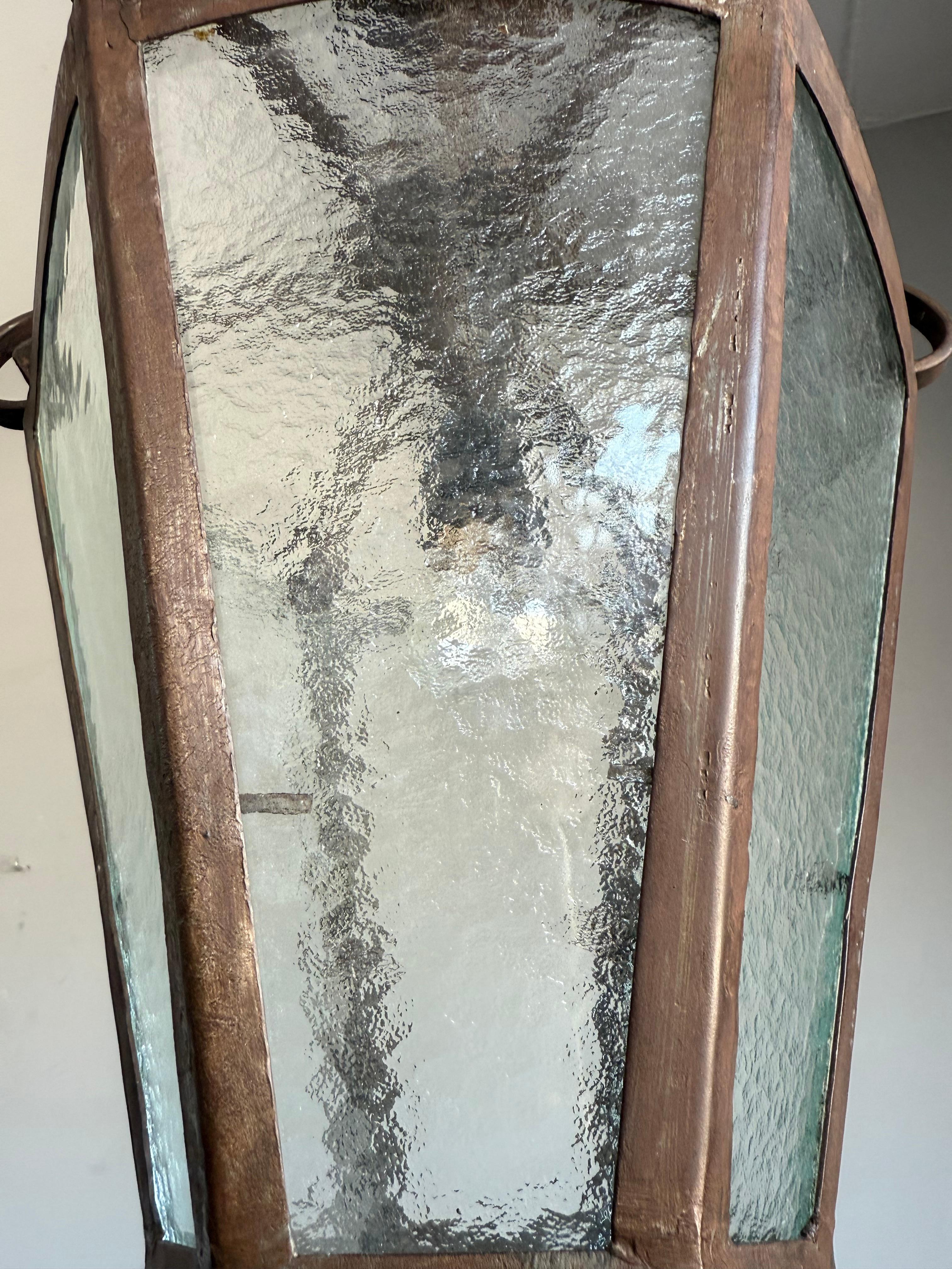 Metal Rare Arts & Crafts Pendant Lantern, Handcrafted Wrought Iron & Cathedral Glass For Sale