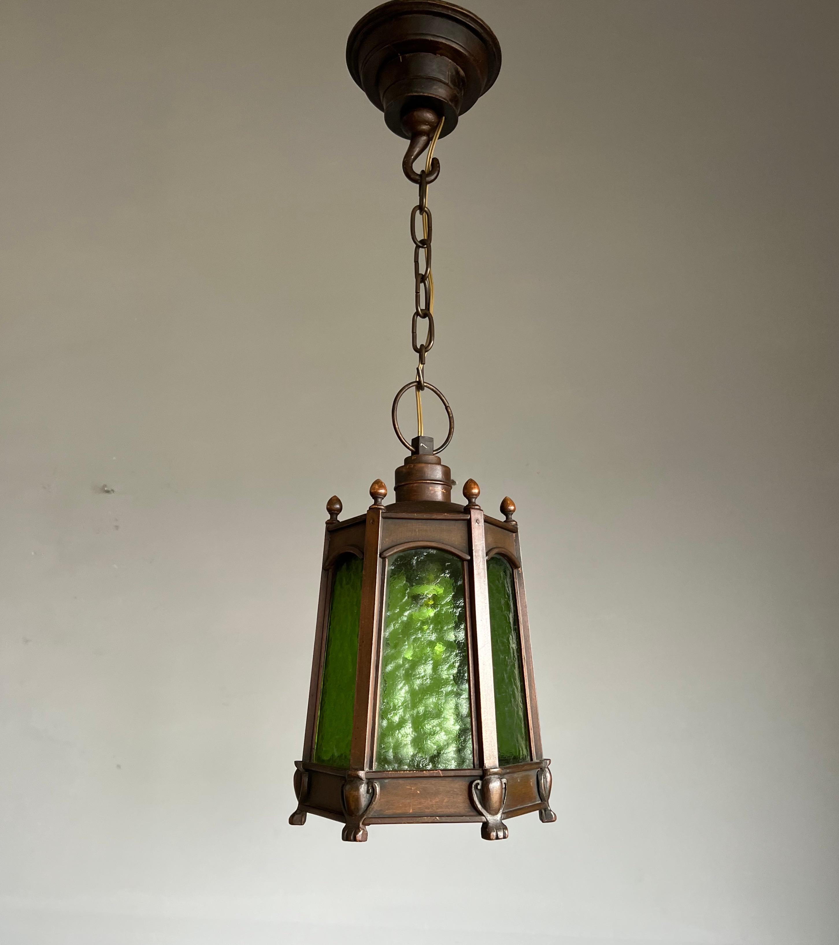 Mint condition, perfectly geometrical and all handmade Arts and Crafts lantern, ceiling light.

Finding rare or unique light fixtures always makes our day and when we came across this handcrafted wooden pendant we were immediately 'sold'. The calm