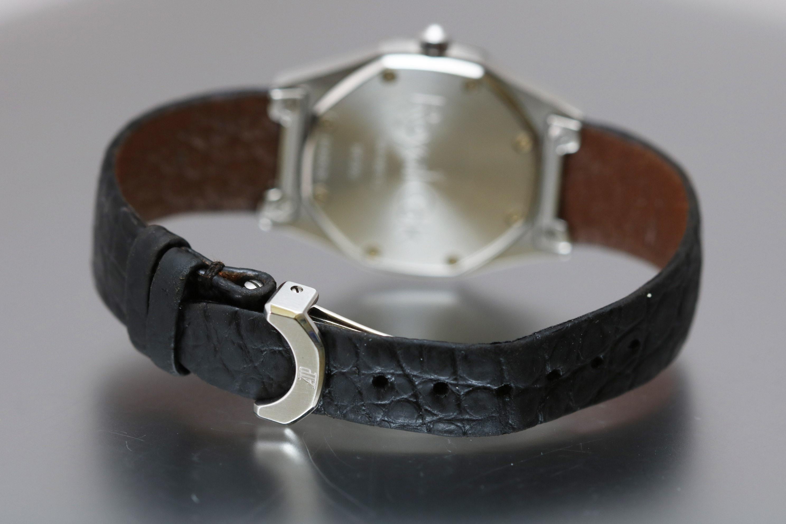 Rare Audemars Piguet Lady's Royal Oak Quartz with an octagonal shaped case, gray tapestry dial with date aperture. Comes on a leather strap and deployant clasp. Reference D50526 29mm