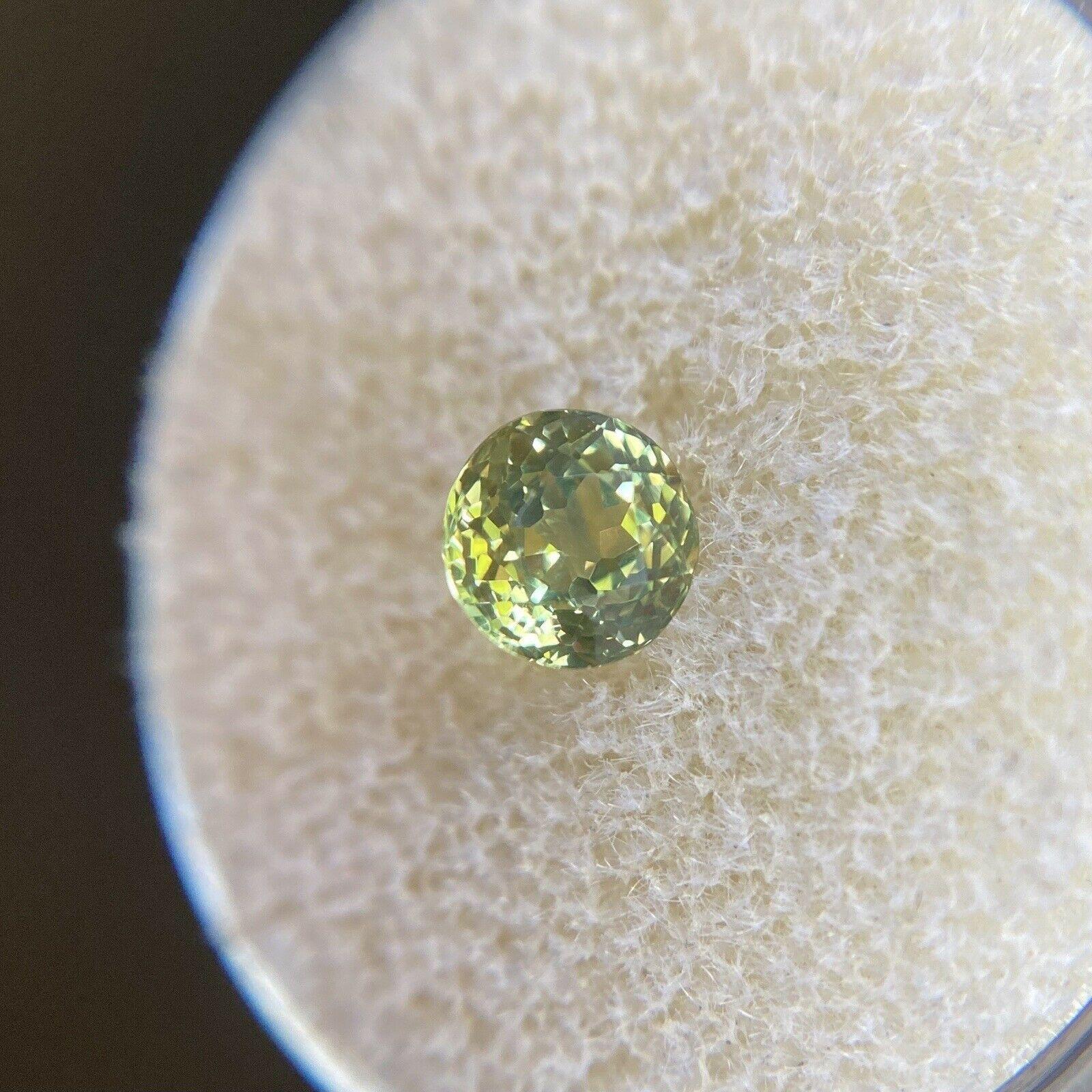 Rare Australian Untreated Green Yellow Bi Colour Sapphire 0.98ct Round Cut 5.4mm

Rare Greenish Yellowish Blue Parti Colour Australian Sapphire Gemstone. 
0.98 Carat with a beautiful and unique green yellow colour. Very rare and stunning to see.