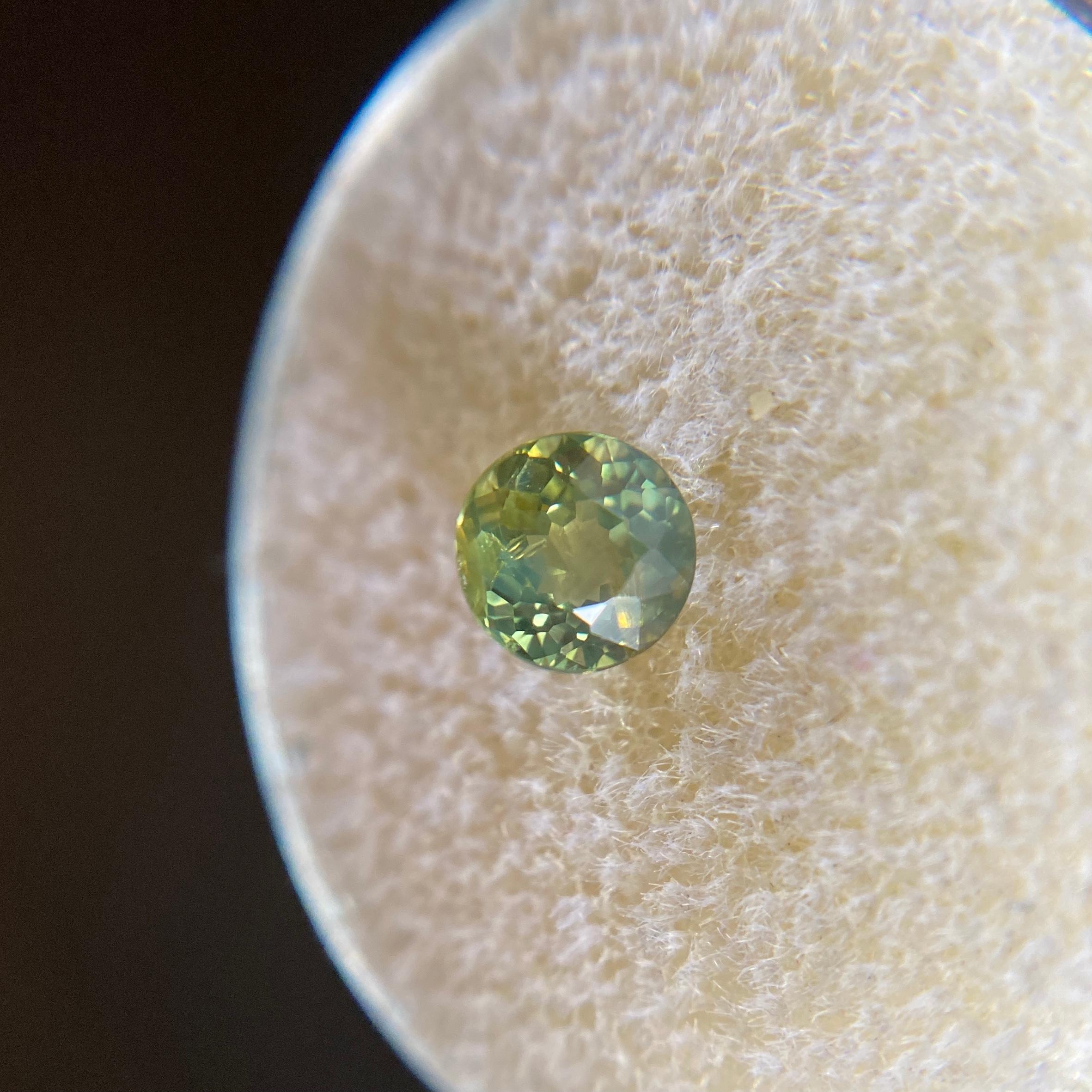 Rare Green Yellowish Parti Colour Australian Sapphire Gemstone.

0.88 Carat with a beautiful and unique green yellow colour. Very rare and stunning to see. Also has good clarity, a clean stone with only some small natural inclusions visible when