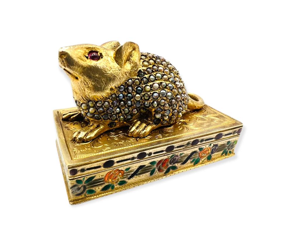 Rare Austrian Silver and Enamel Stamp Box with Mouse and Seed Pearls

The Quality is Fantastic, so well executed, in great condition this item is ready to use.

Marked 84 and then over marked Germany not sure why this was done possibly at the time