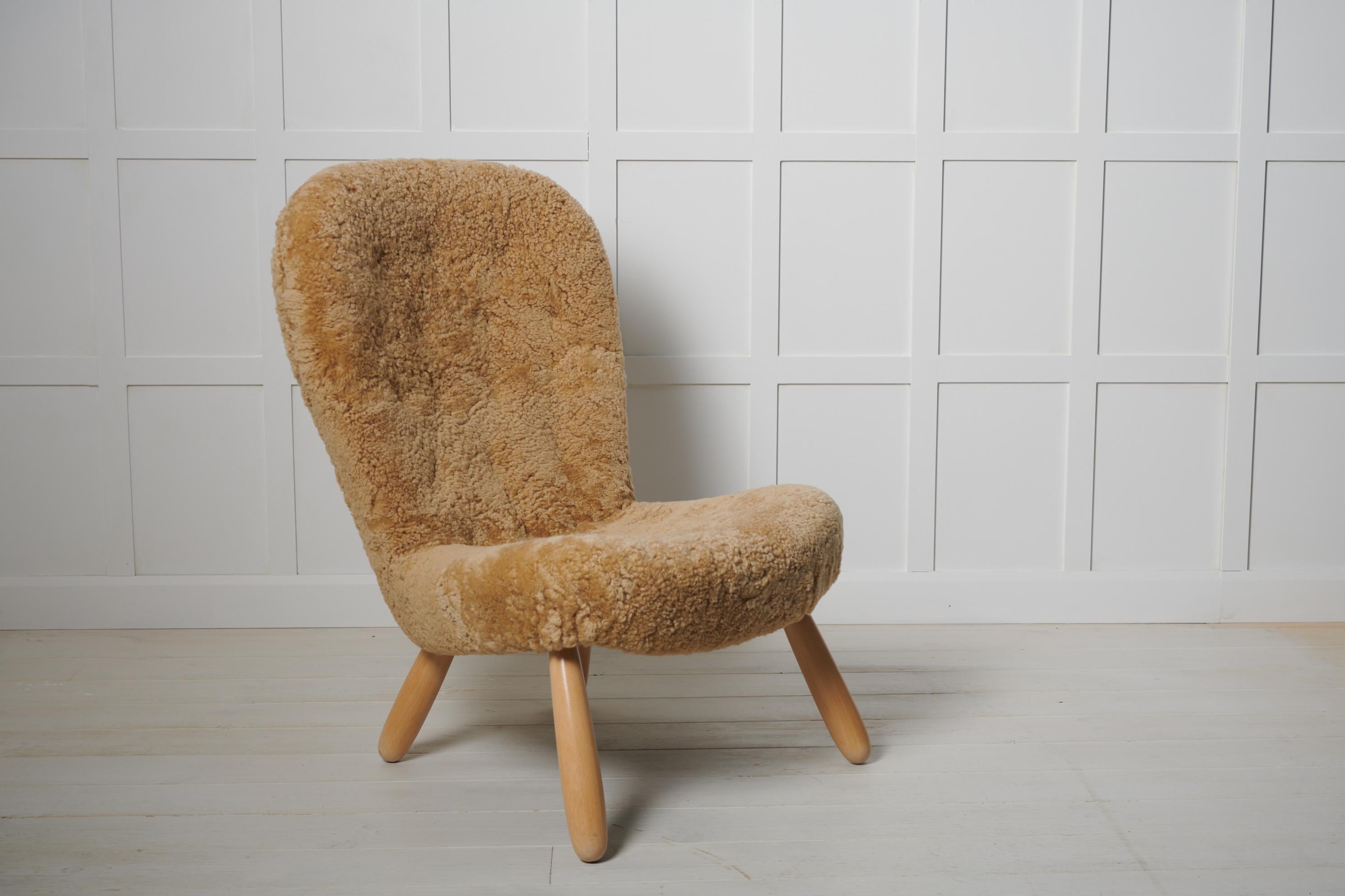 Cuir de mouton Authentique et rare chaise à palourdes moderne scandinave par Arnold Madsen, Danemark en vente