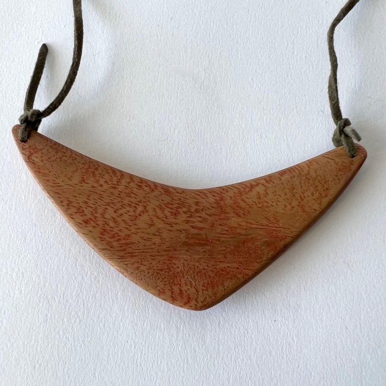 Modernist Rare Barney Reid San Diego Modern Hand Carved Wood Boomerang Pendant For Sale