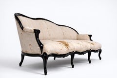 Rare canapé en noyer laqué noir de style baroque, 19e siècle