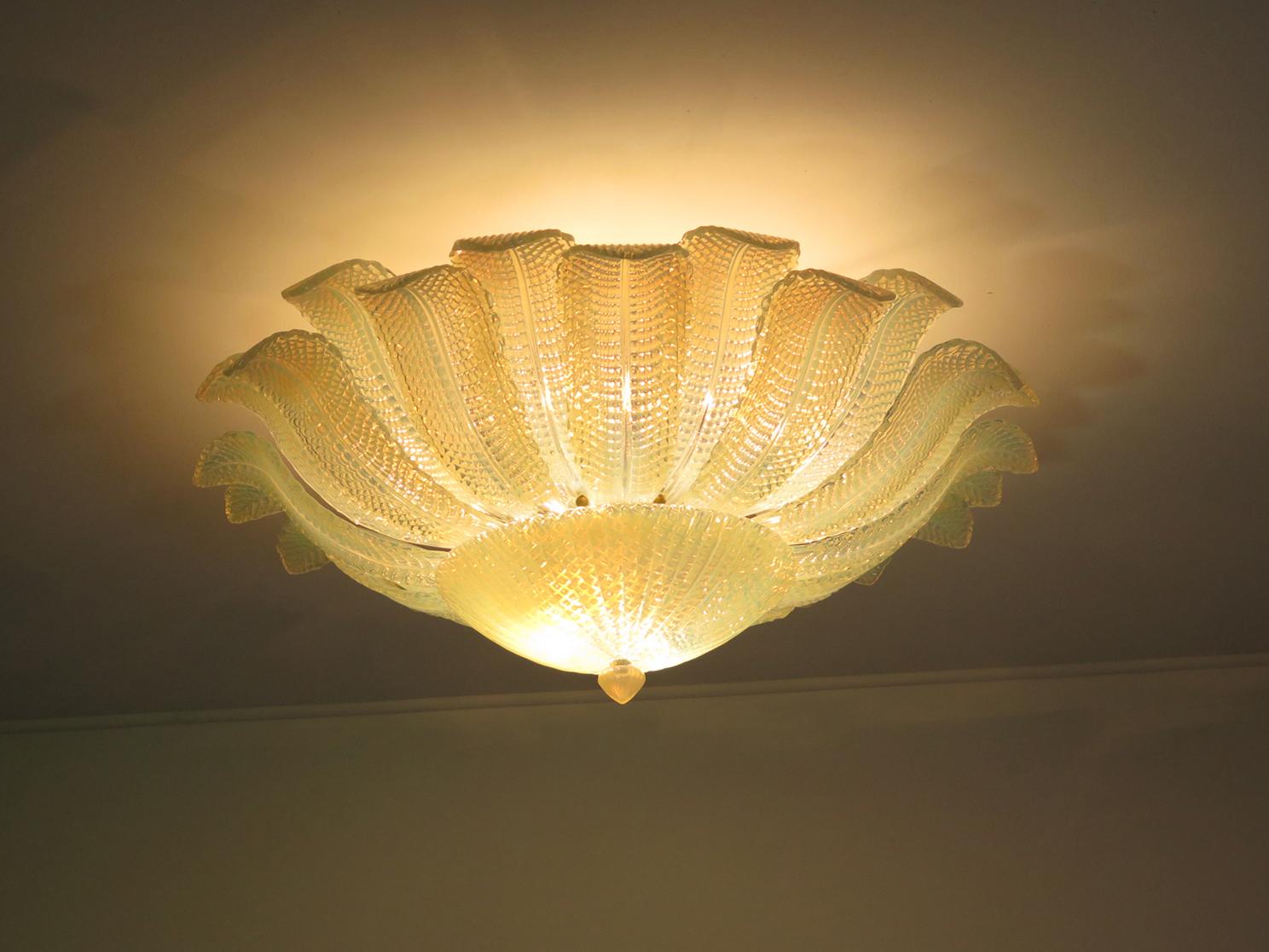 Fantastic and fabulous of vintage Barovier and Toso Murano Italy art glass ceiling light. The rare lamp is made of 24 mouth-blown hand-formed leaf-form OPALINO glass panels plus a huge glass as a bottom.This beauty has the look of a precious big