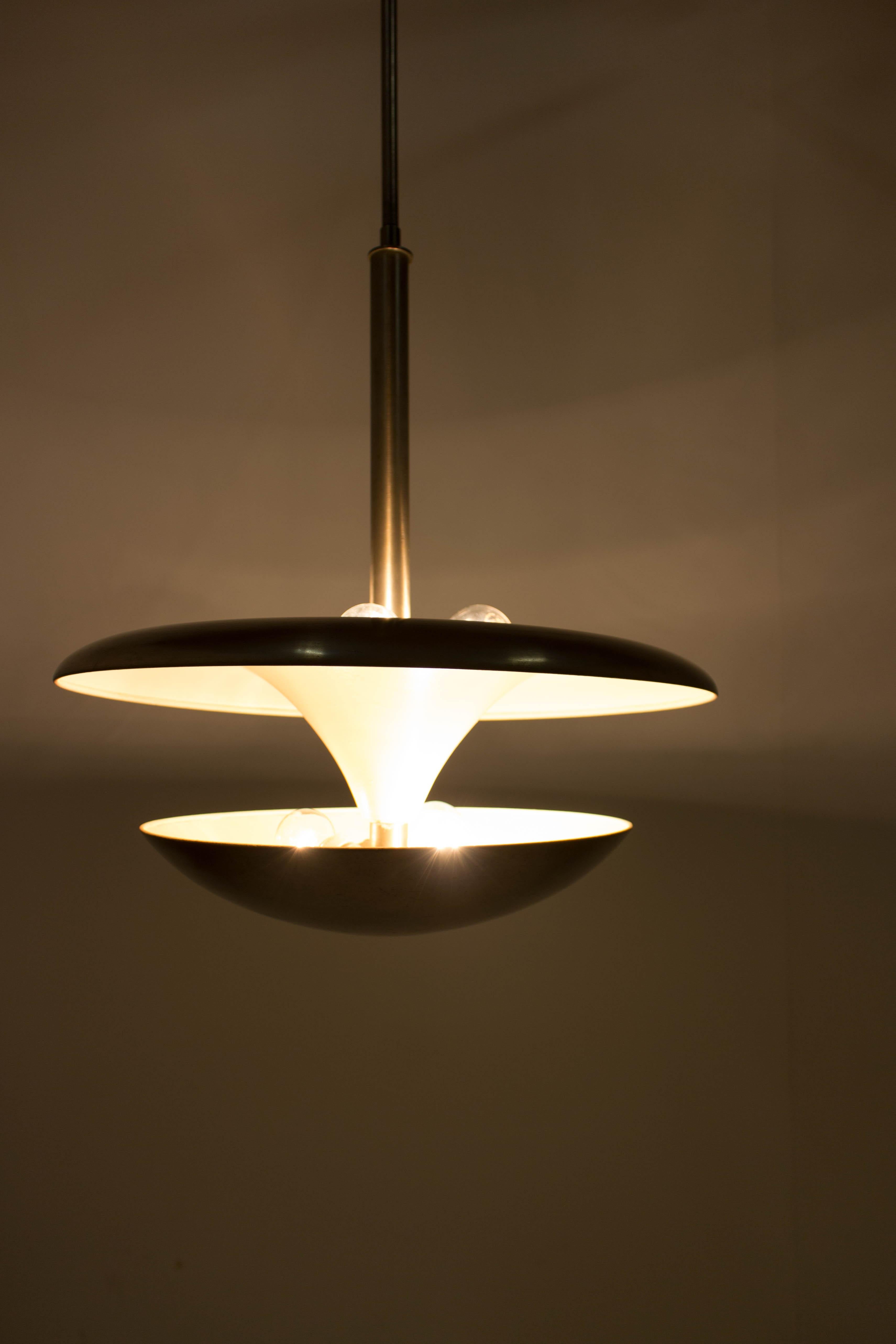 Very rare Bauhaus chandelier designed by Frantisek Anyz in 1920s and produced by his company IAS. Nickel-plated. Upper and lower bulbs could be switched separately to produce different kinds of lighting. Very elegant! Very rare! Very good condition.