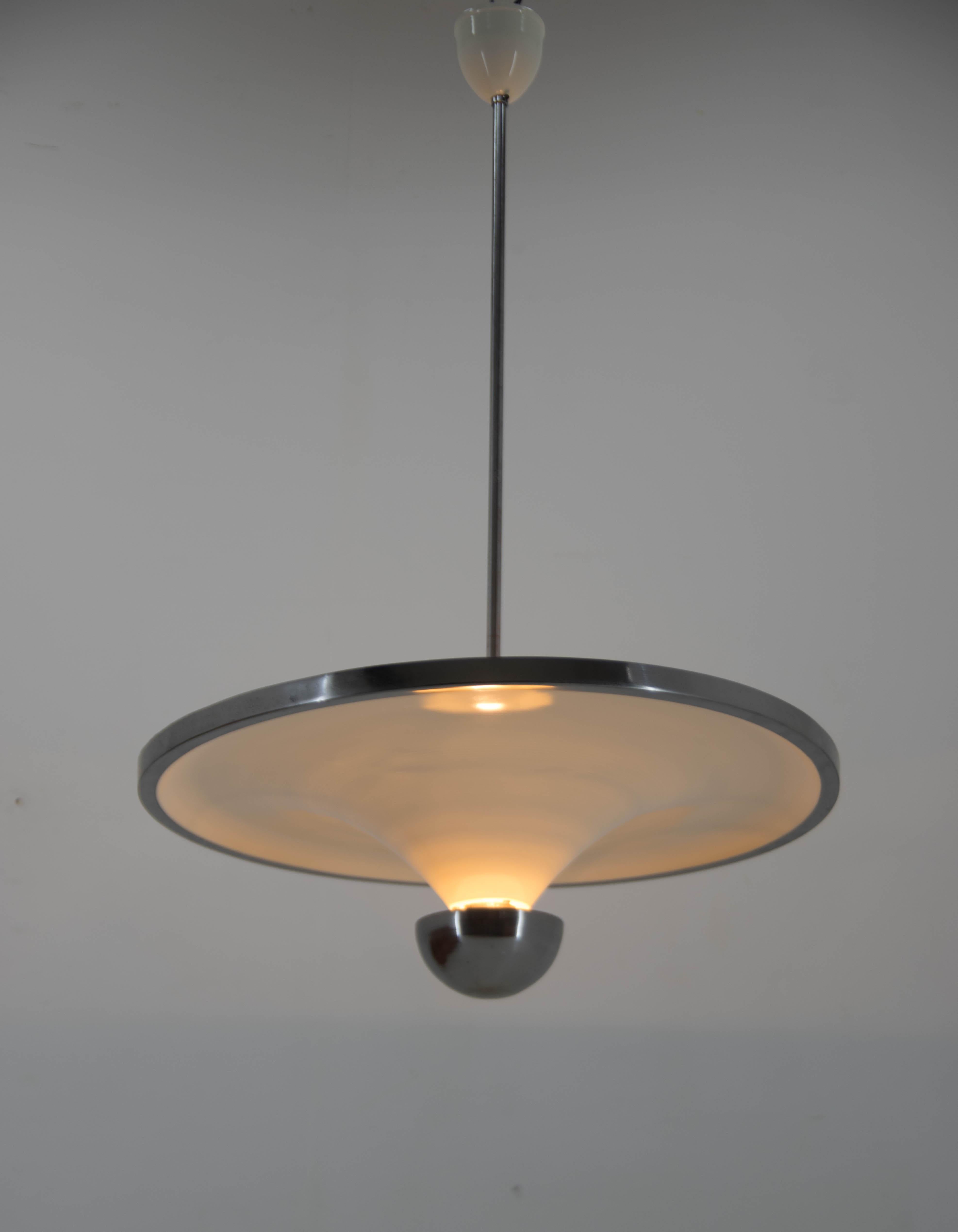 Beautiful simple and elegant chandelier with indirect light and adjustable lower bulb designed by Franta Anyz and executed by IAS in 1920s. 
Carefully restored: 
new ivory color paint
rewired: two separate circuits - 3x60W on upper side
1x100W on