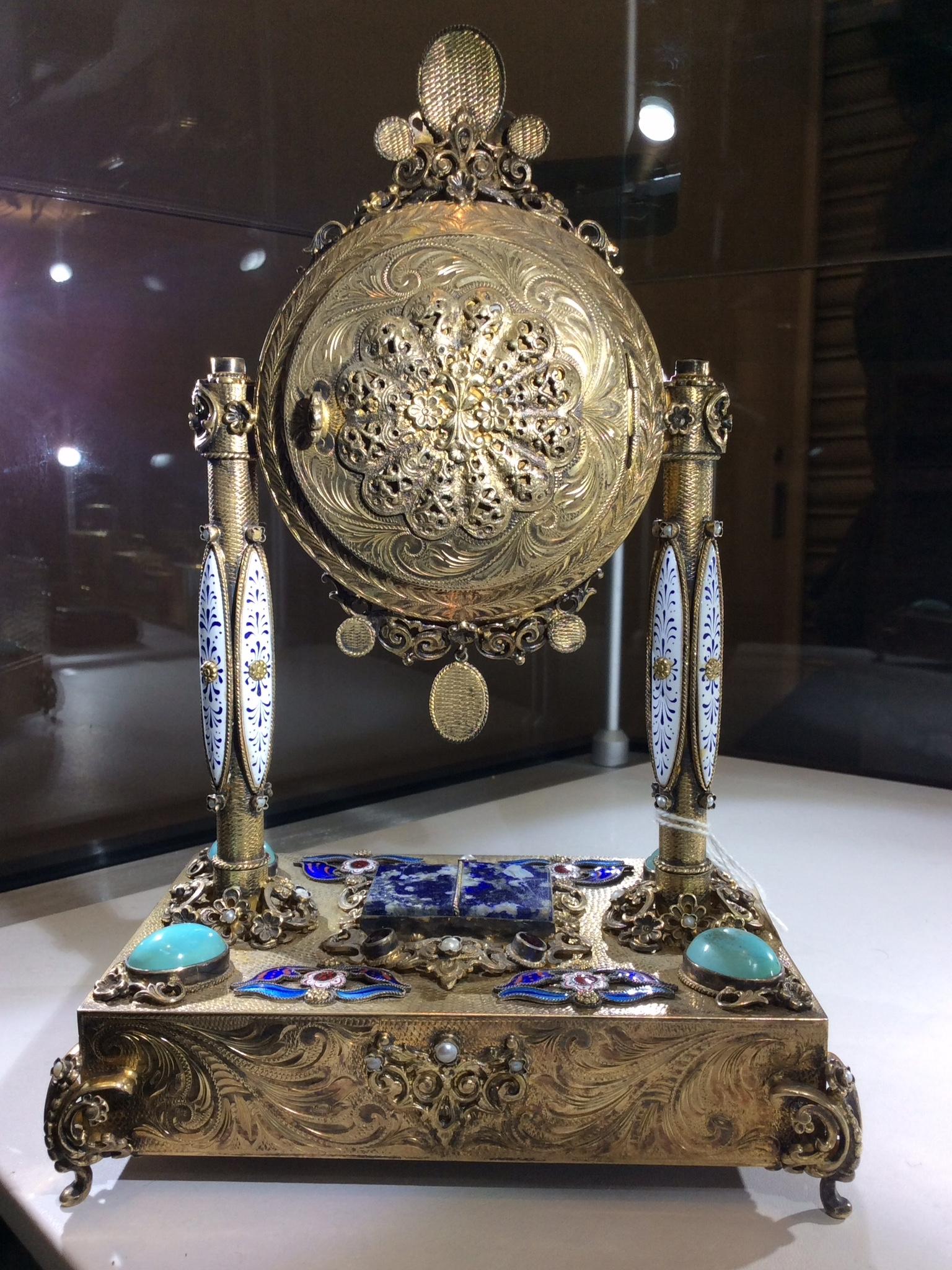 A rare late 19th century Viennese ormolu, silver, enamelled, pearl and semi precious stone mounted musical table clock 

A beautifully handcrafted musical Austrian table clock that was made for the Chinese market. The clock has a solid silver gilt