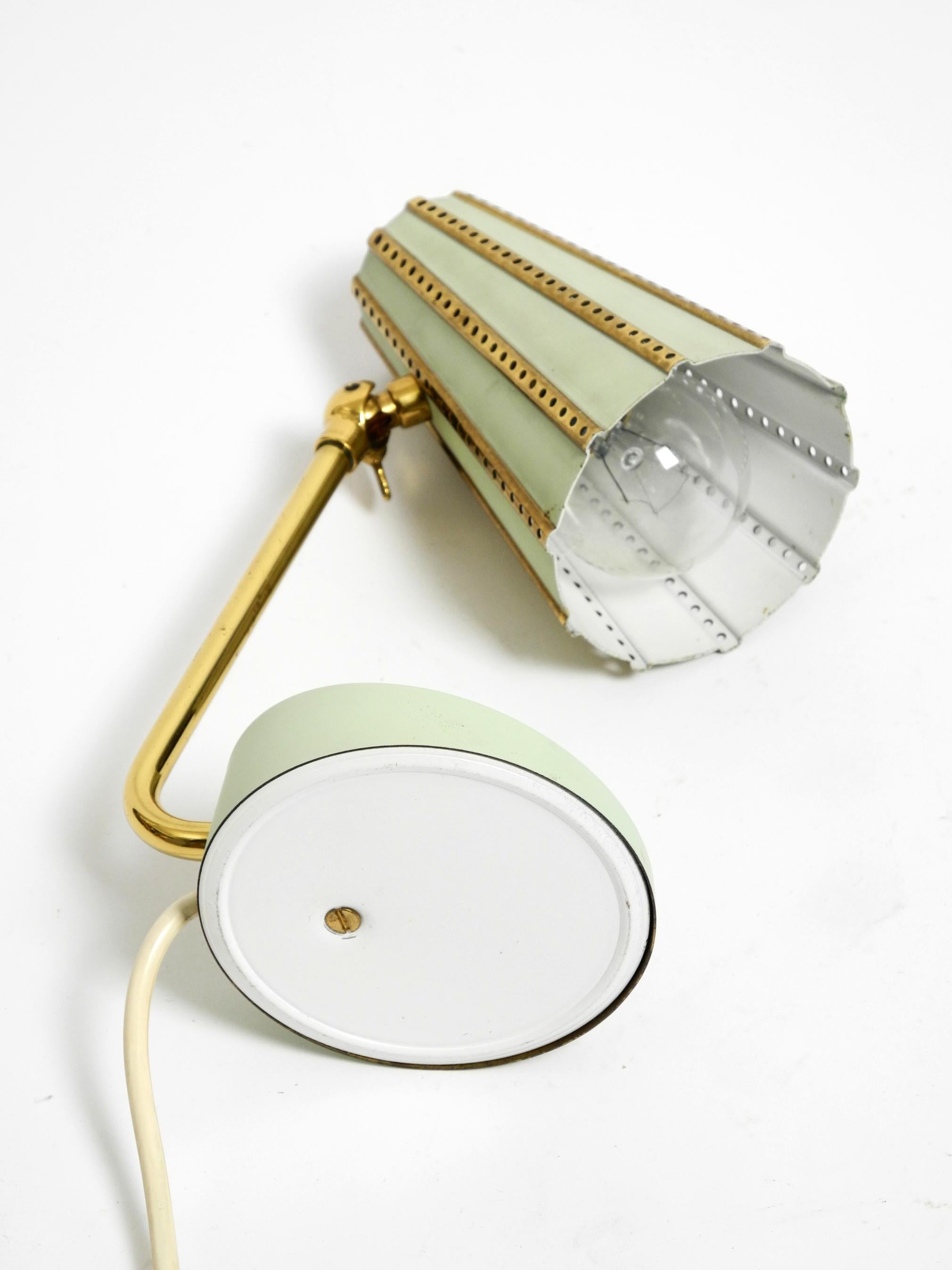 Rare beautiful mid-century brass night table lamp with a perforated metal shade For Sale 3