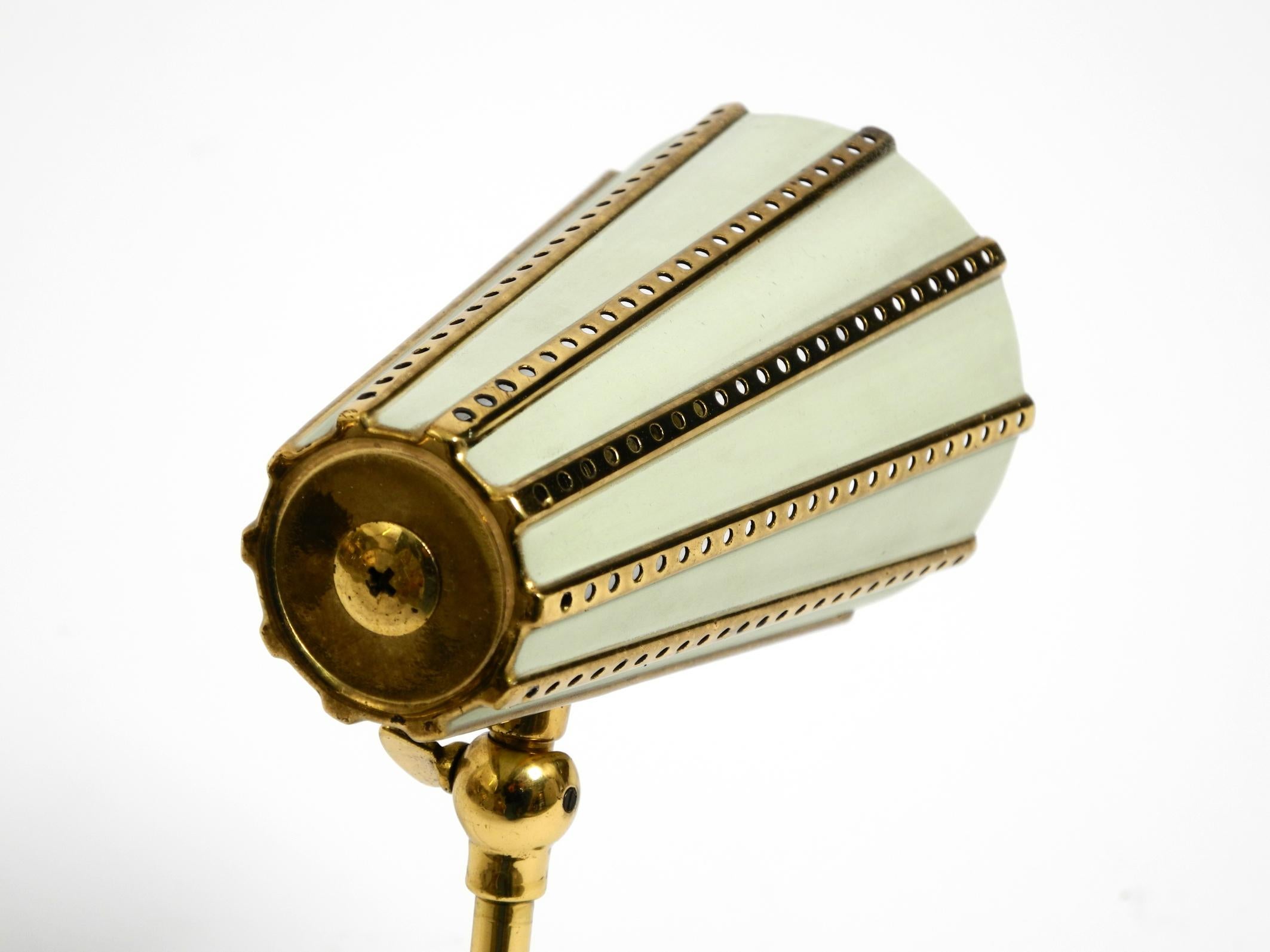 Rare beautiful mid-century brass night table lamp with a perforated metal shade For Sale 5