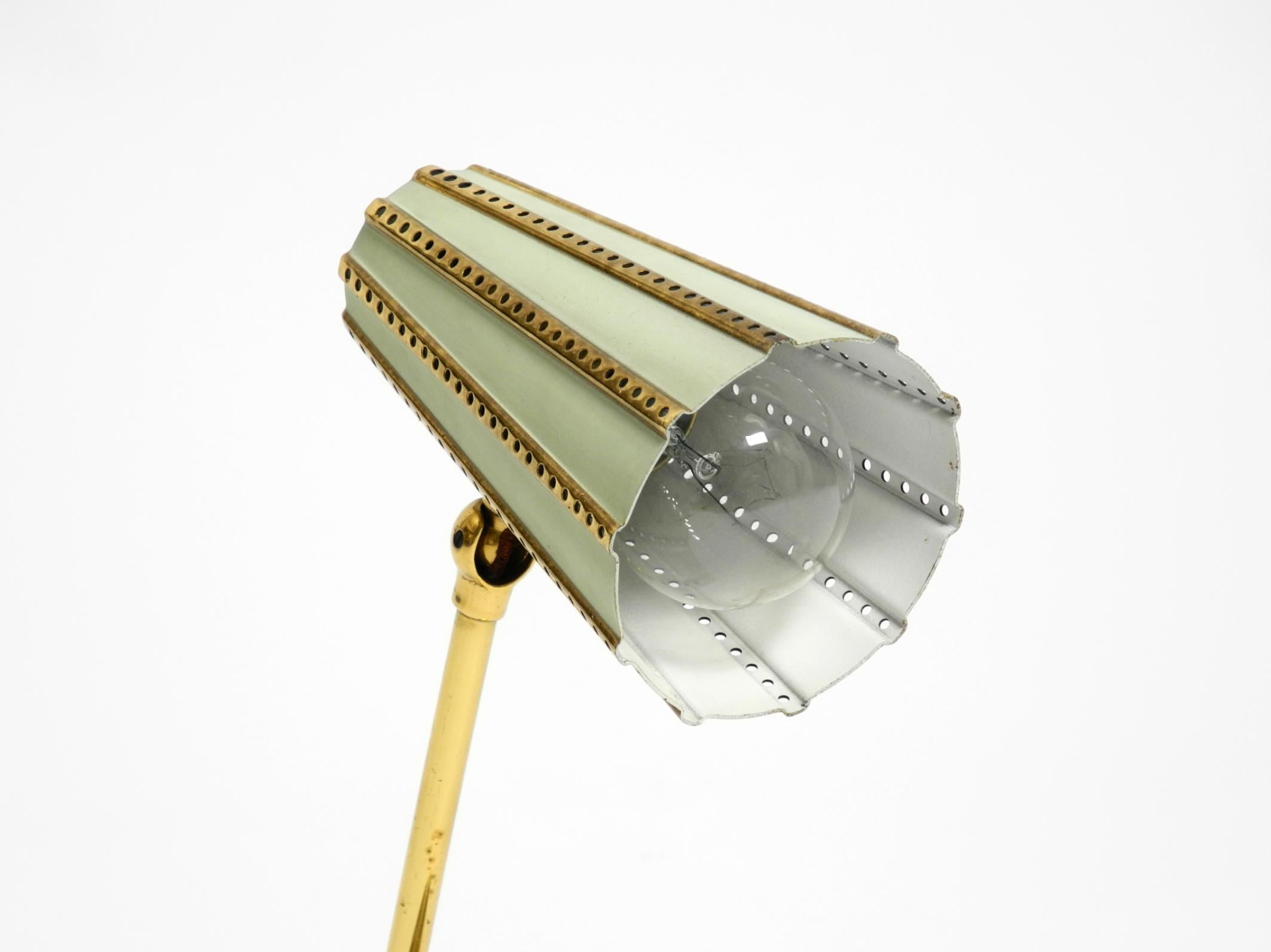 Rare beautiful mid-century brass night table lamp with a perforated metal shade For Sale 6