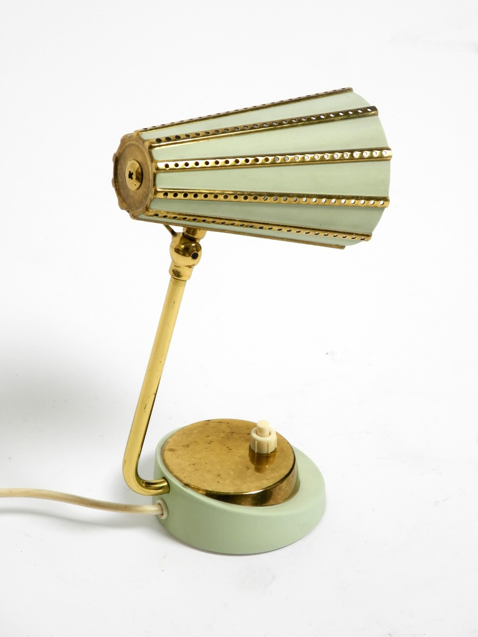 Rare beautiful mid-century brass night table lamp with a perforated metal shade For Sale 7