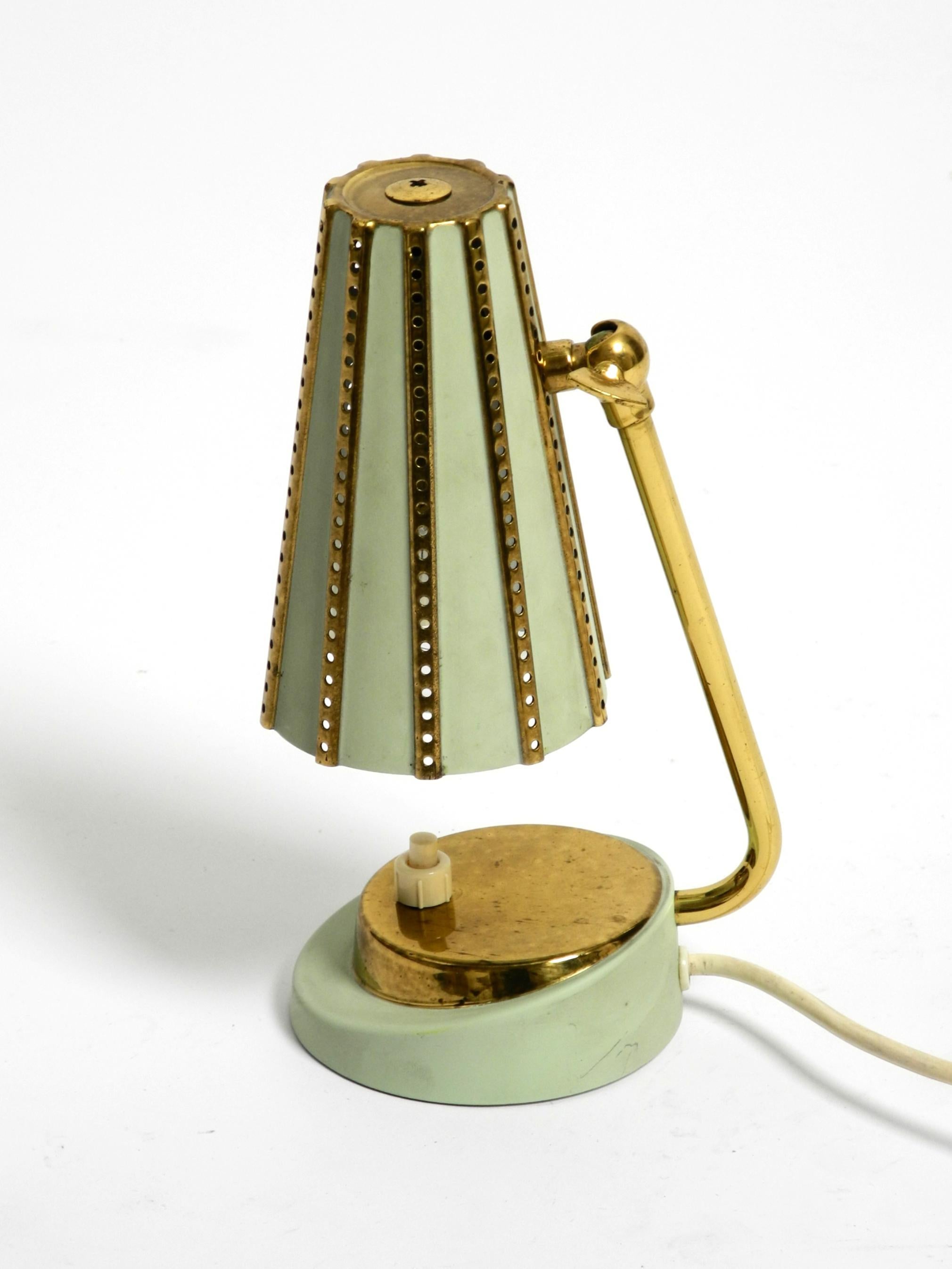 Rare beautiful mid-century brass night table lamp with a perforated metal shade For Sale 8