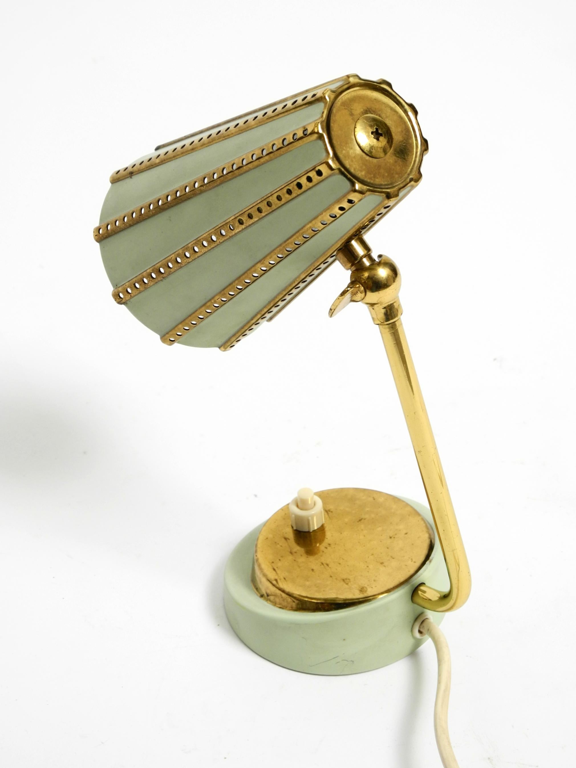 Rare beautiful mid-century brass night table lamp with a perforated metal shade For Sale 9