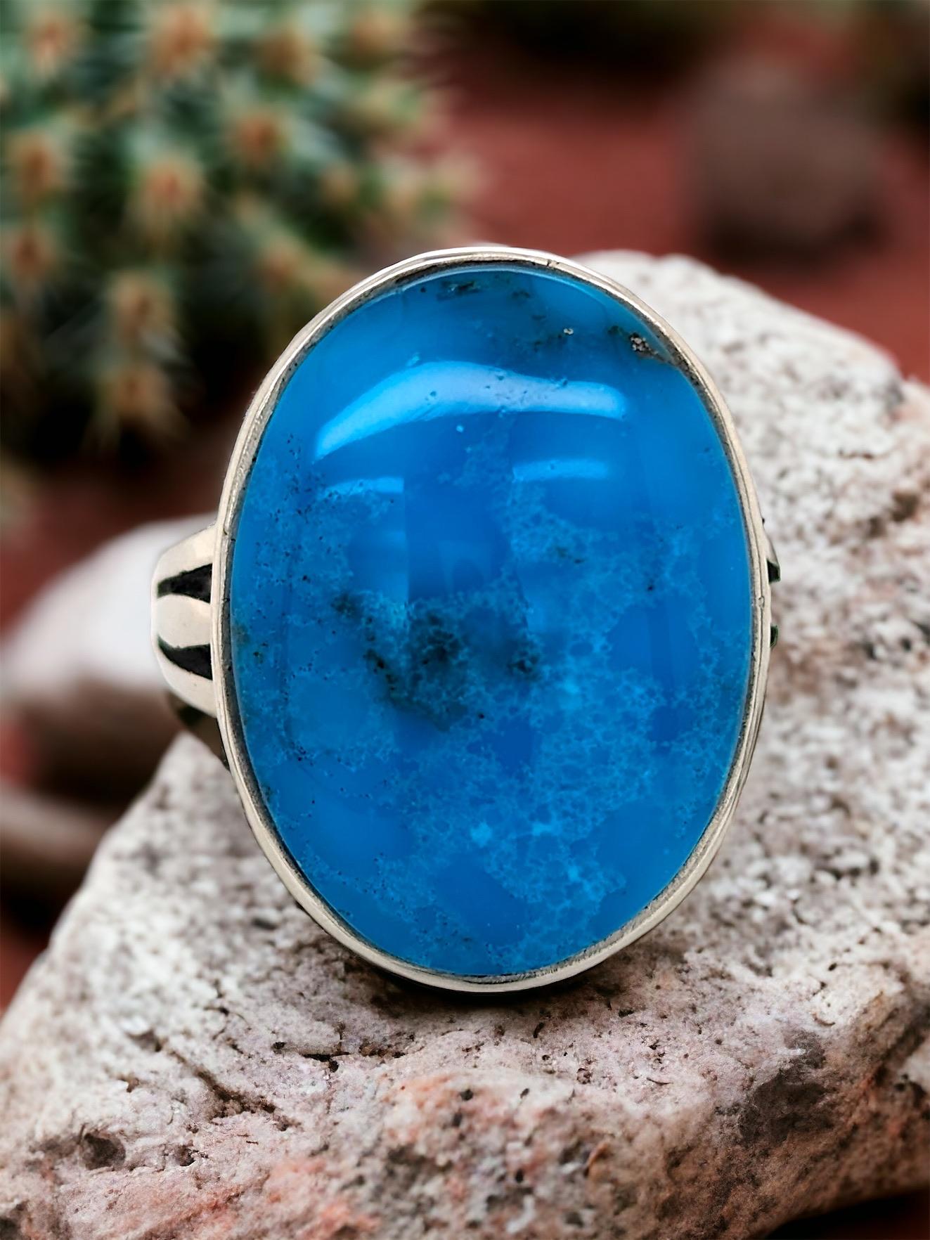 Own a piece of exceptional beauty with this captivating Size 7 Ring.  This masterpiece features a rare and stunning Bingmay turquoise gemstone, known for its captivating color and remarkable translucency.

Exceptional Gem Quality: This Bingmay
