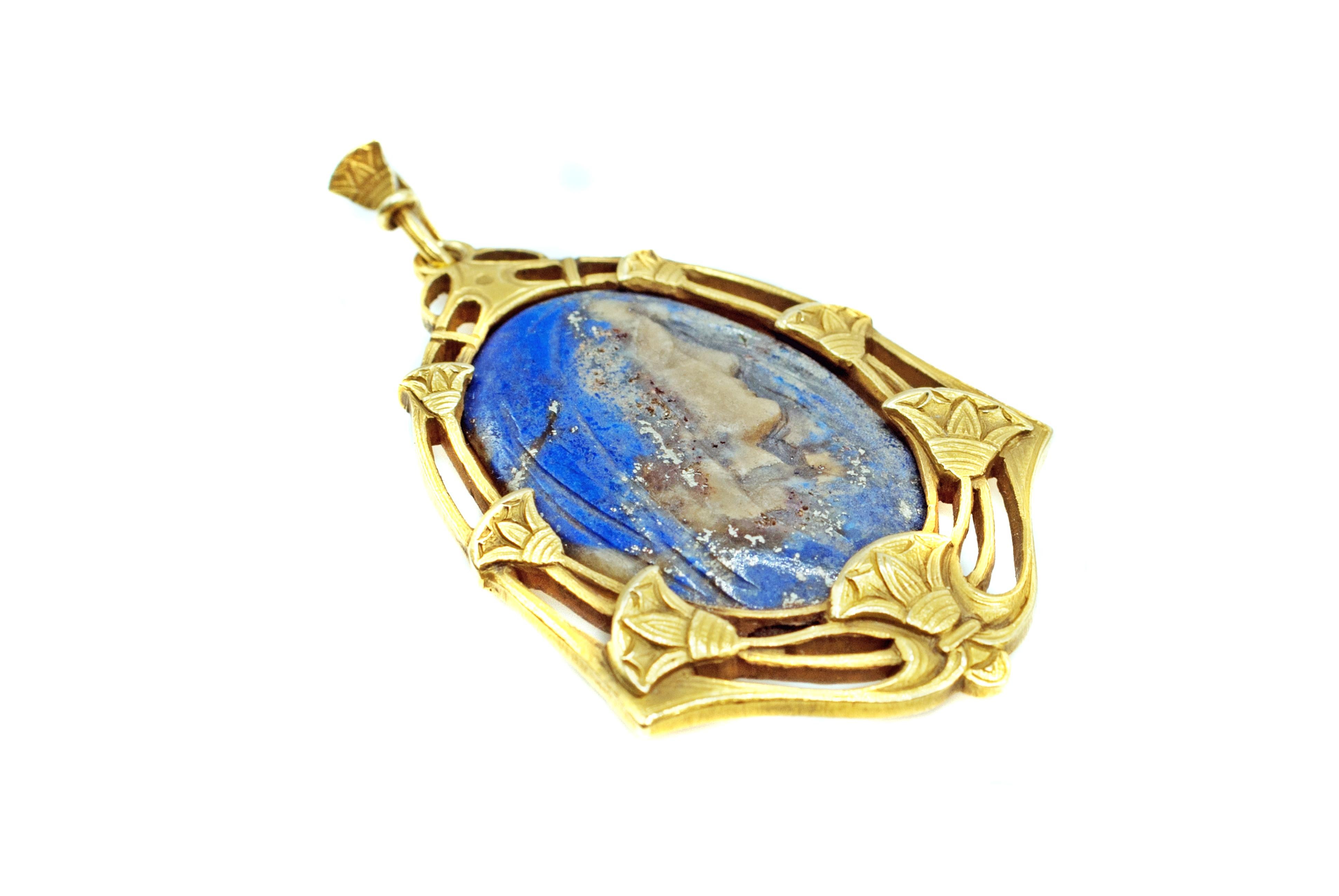 This unique hand-carved depiction of the Virgin Mary is crafted out of one piece of Lapis Lazuli, having masterfully used the different layers - Lazurite for the veil and cape and Calcite for the face and neck. Every detail of the face, neck and