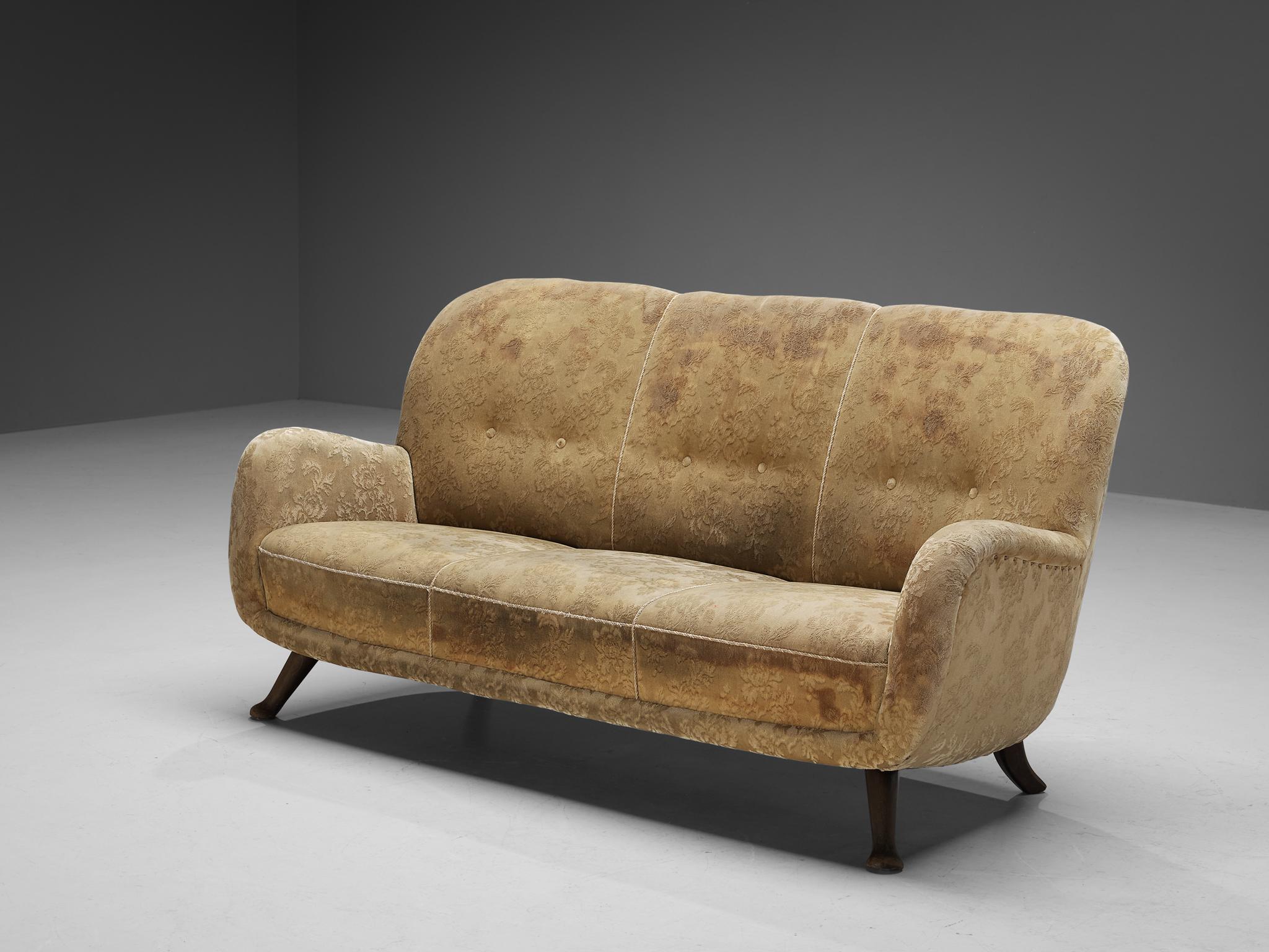 Berga Mobler, sofa, beech, velvet, Denmark, 1940s.

This bold and rounded sofa is very comfortable. The whole shell is slightly tilted backwards. The sofa rests on small beech legs that bend outwards and are slightly tapered and ornate. The