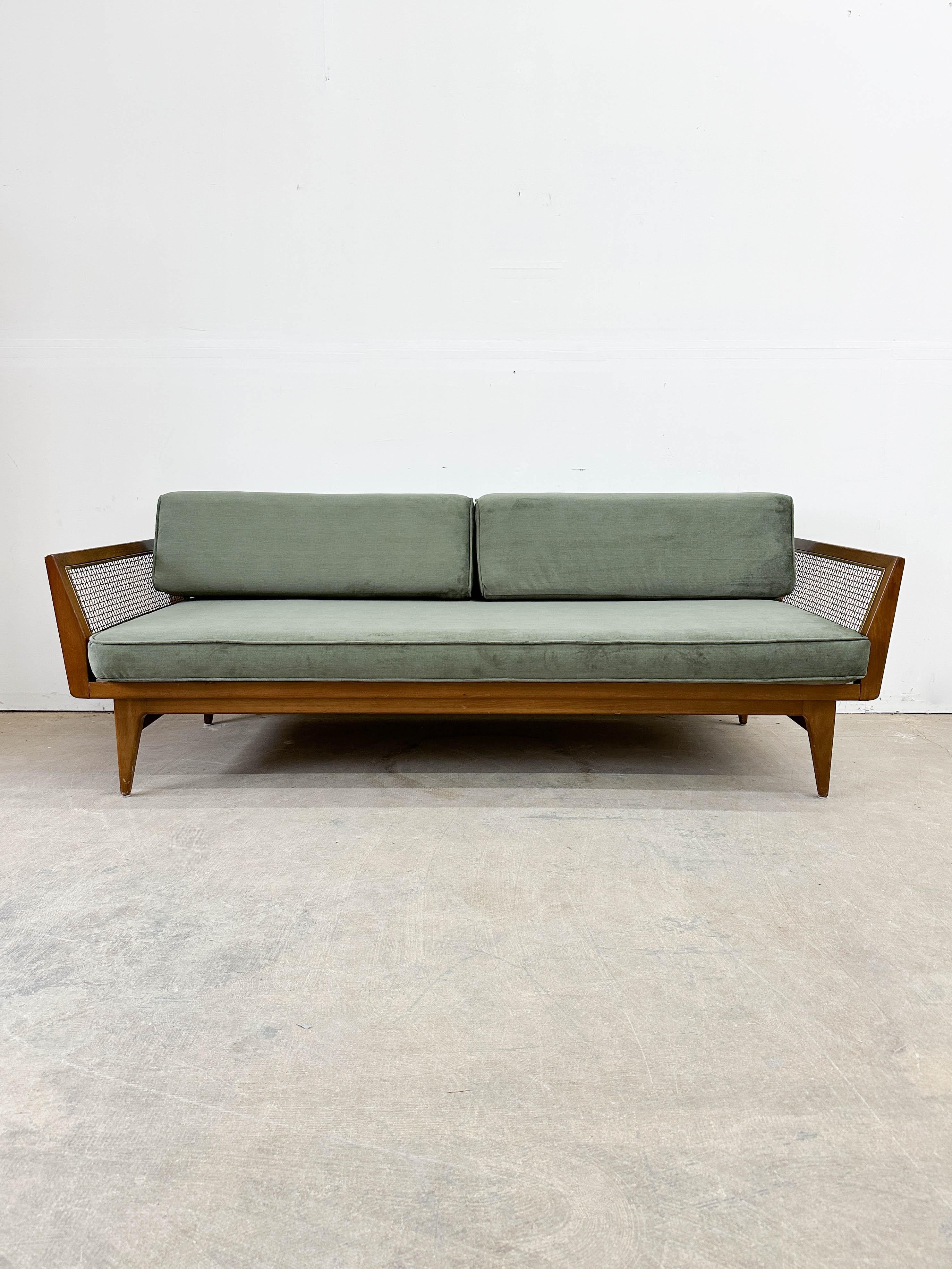 Rare solid walnut frame sofa with brass wire inset arm panels designed by Bertha Schaefer for Singer & Sons around 1954. Part of the critically acclaimed Singer & Sons collection with other esteemed designers including Gio Ponti, Carlo Molino, Carlo