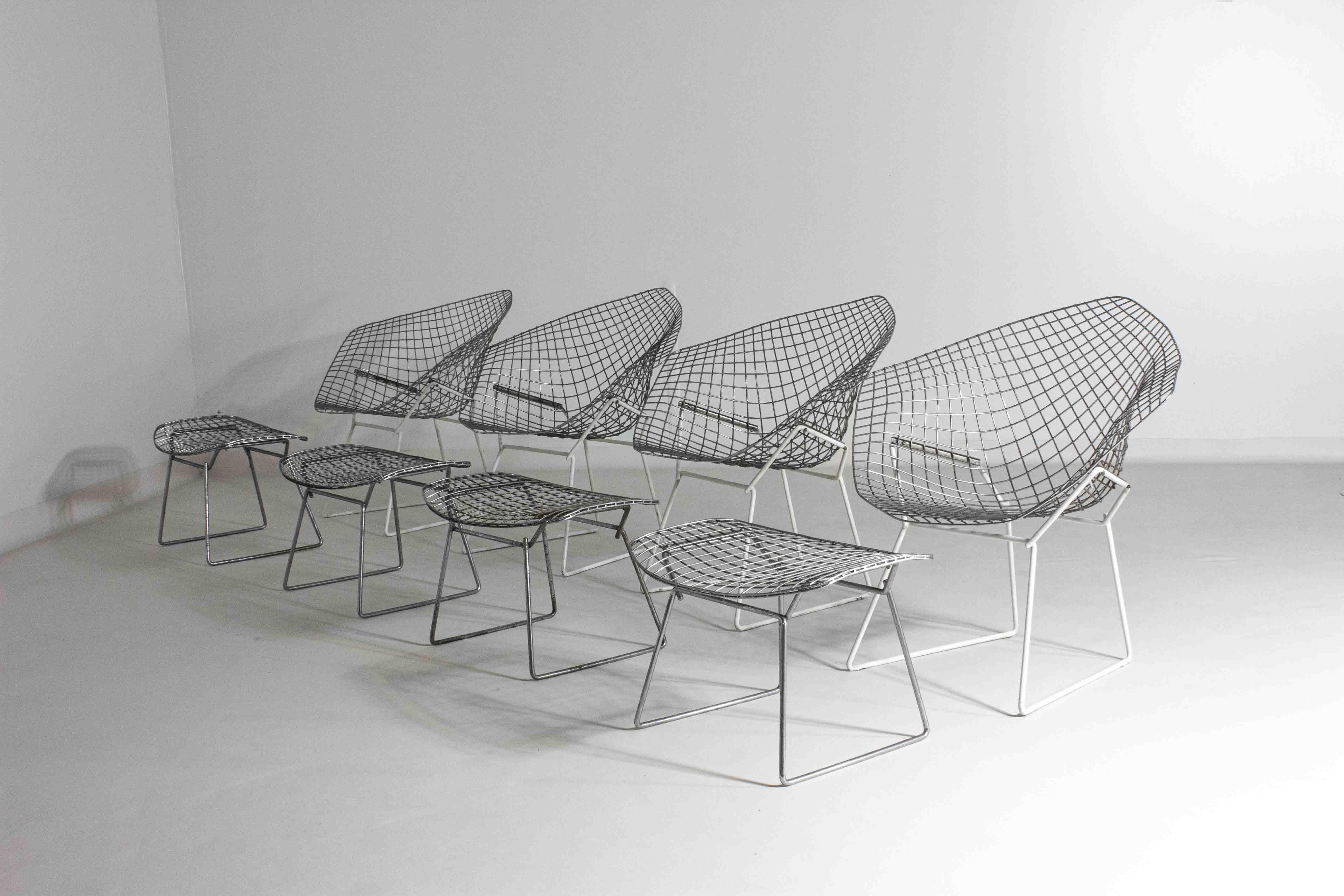 Harry Bertoia’s Diamond Chair, introduced in 1952, is a masterpiece of mid-century design. Crafted from welded steel rods, the chair’s open, airy structure gives the illusion of floating space, earning it the nickname “sitting on air.” Bertoia, a